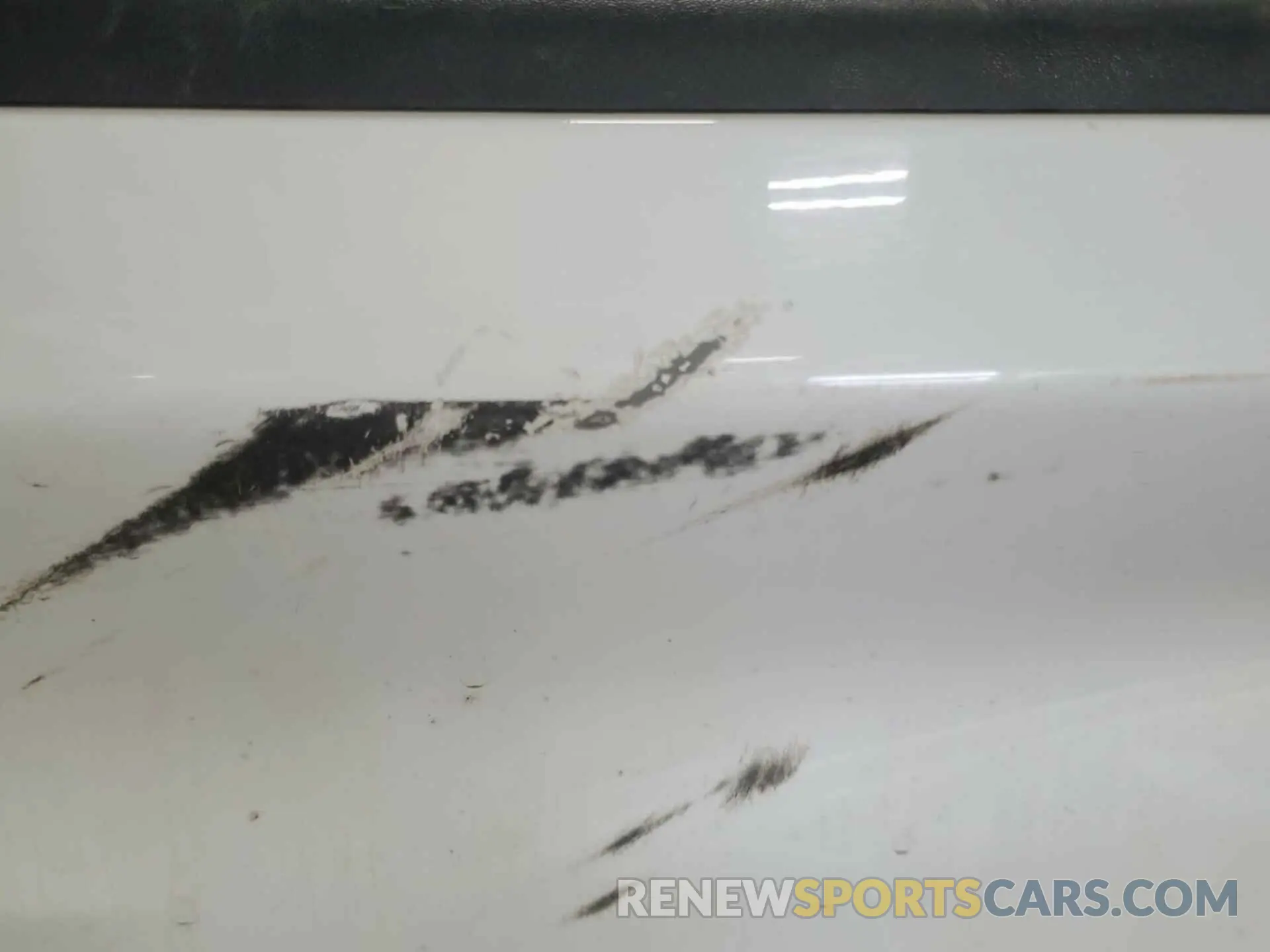 1 Photograph of a damaged car 1C6SRFMT1MN714659 RAM 1500 2021