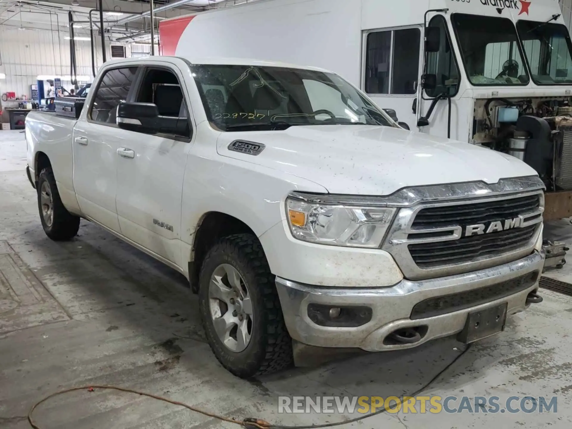 16 Photograph of a damaged car 1C6SRFMT1MN714659 RAM 1500 2021