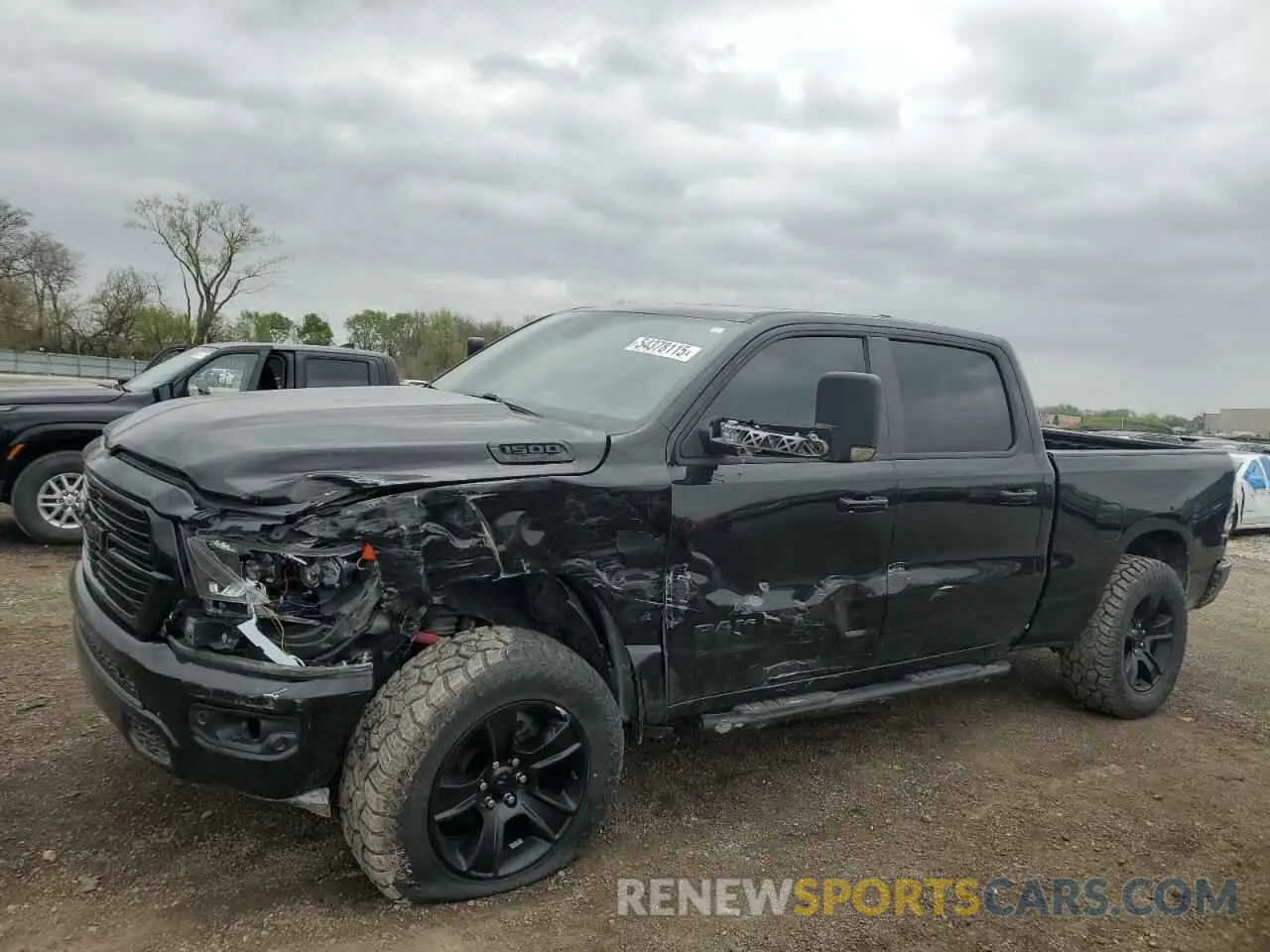 1 Photograph of a damaged car 1C6SRFMT1MN774182 RAM 1500 2021