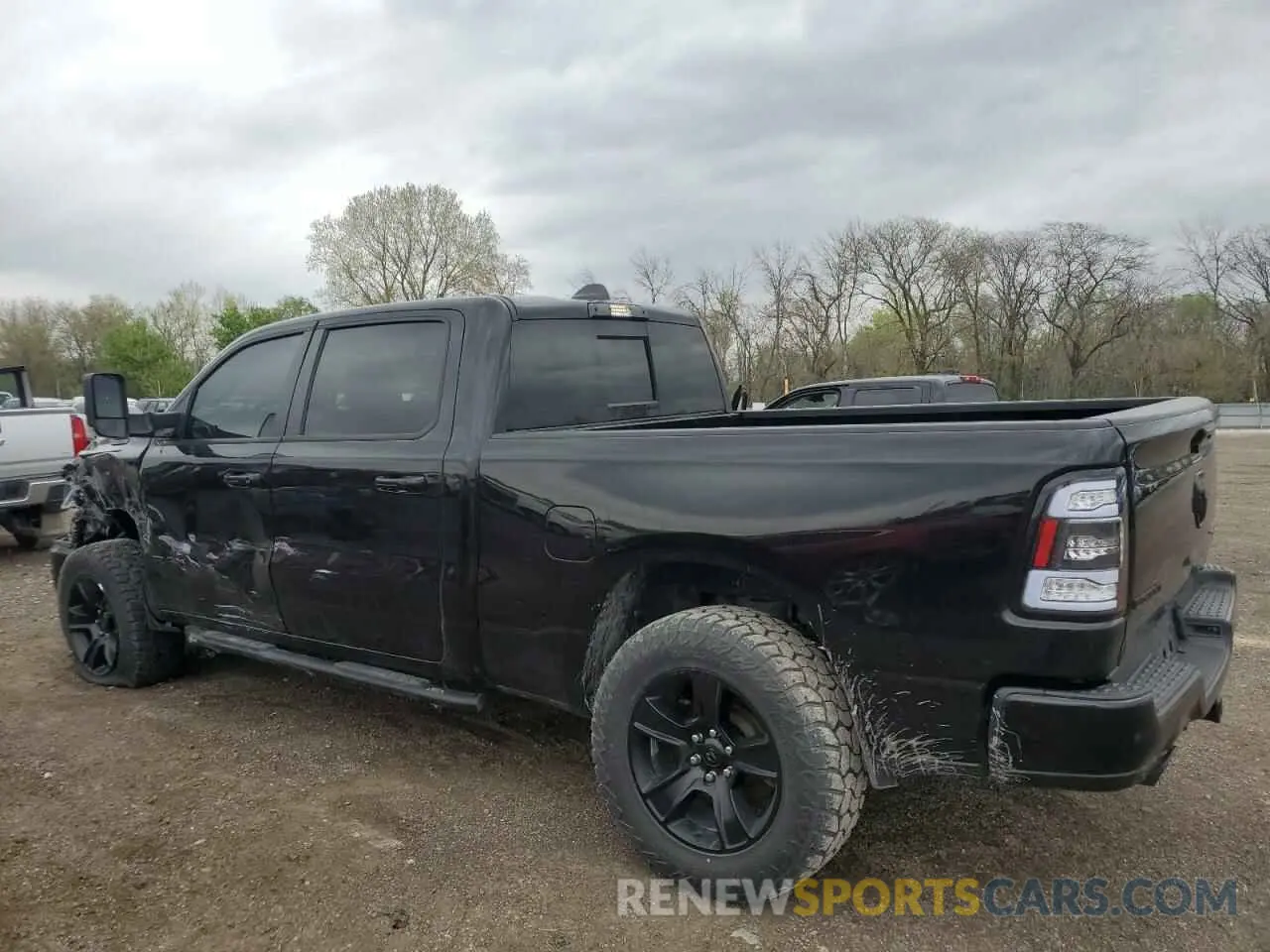 2 Photograph of a damaged car 1C6SRFMT1MN774182 RAM 1500 2021