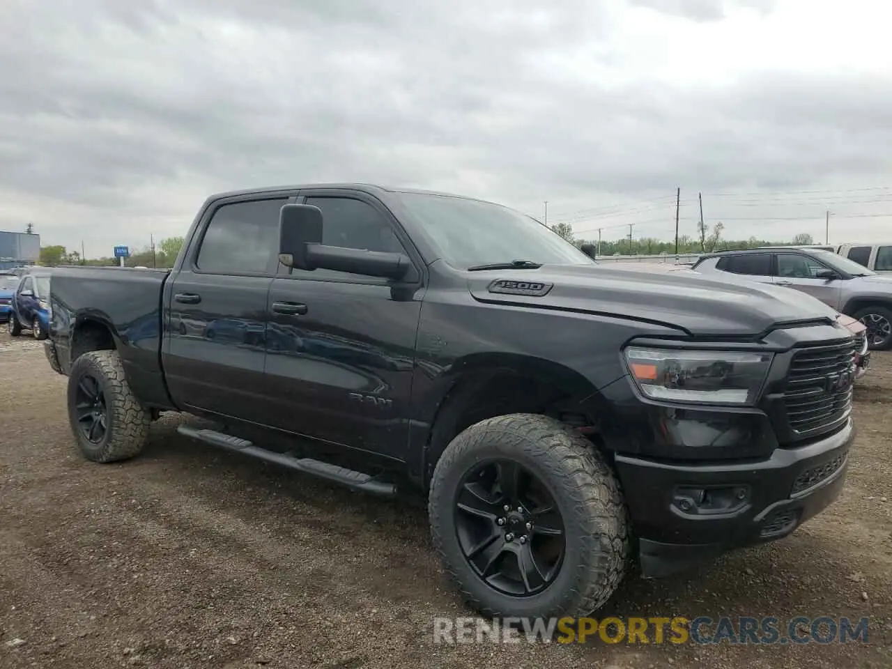 4 Photograph of a damaged car 1C6SRFMT1MN774182 RAM 1500 2021