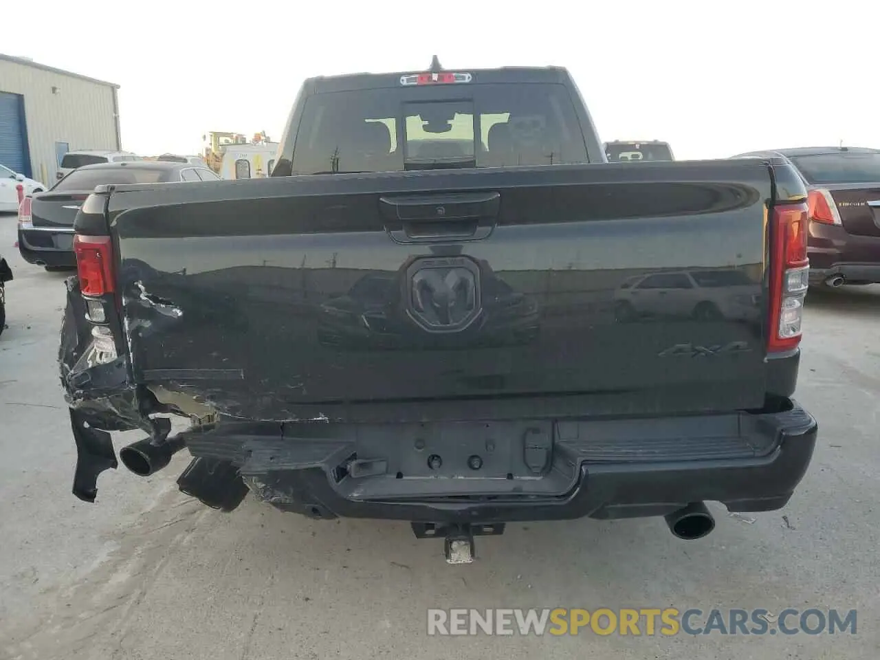 6 Photograph of a damaged car 1C6SRFMT1MN800828 RAM 1500 2021