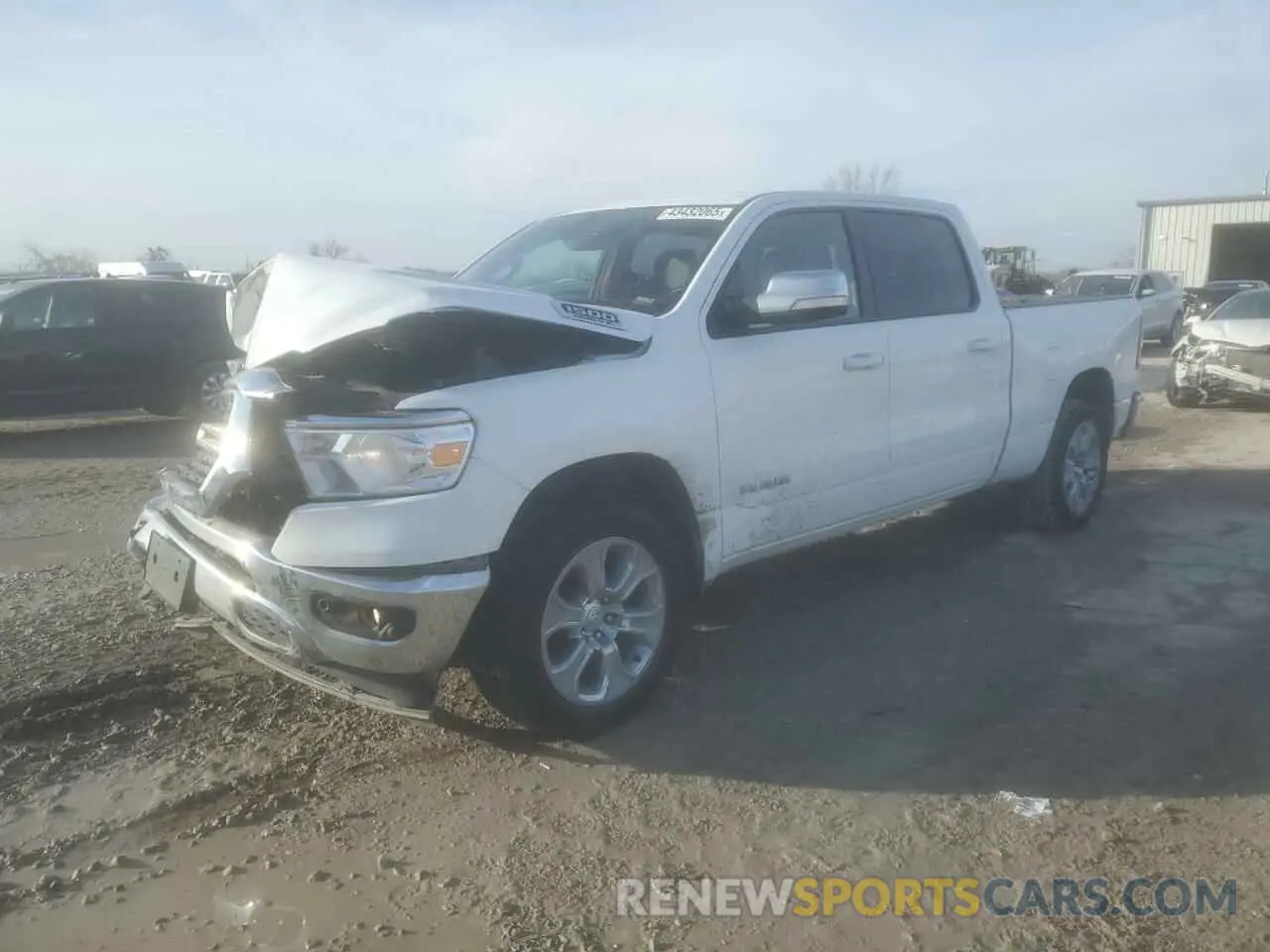 1 Photograph of a damaged car 1C6SRFMT3MN546006 RAM 1500 2021