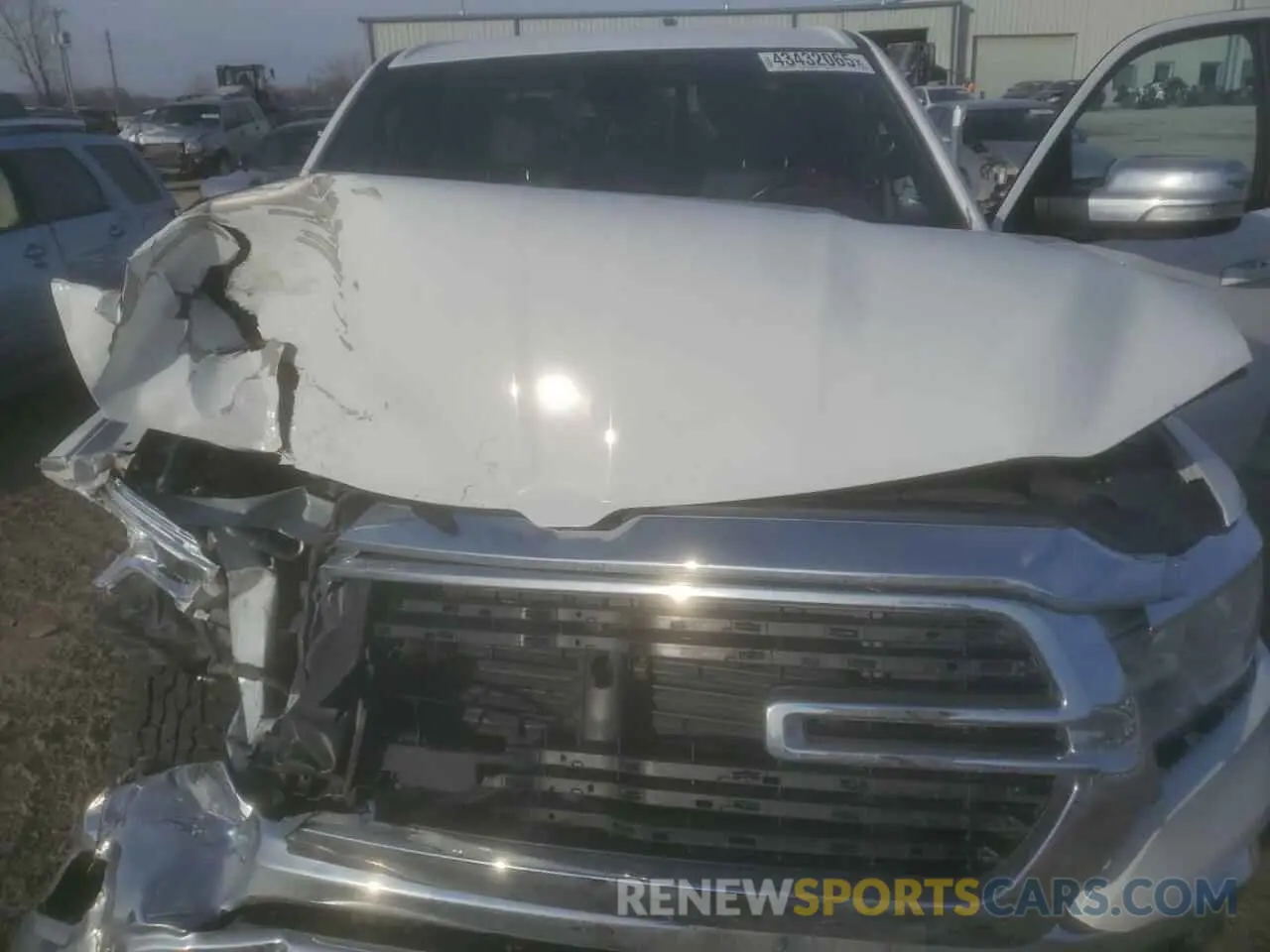 12 Photograph of a damaged car 1C6SRFMT3MN546006 RAM 1500 2021
