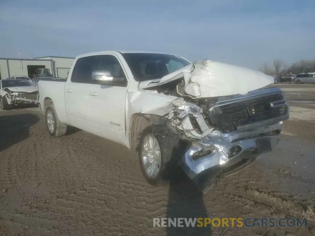 4 Photograph of a damaged car 1C6SRFMT3MN546006 RAM 1500 2021