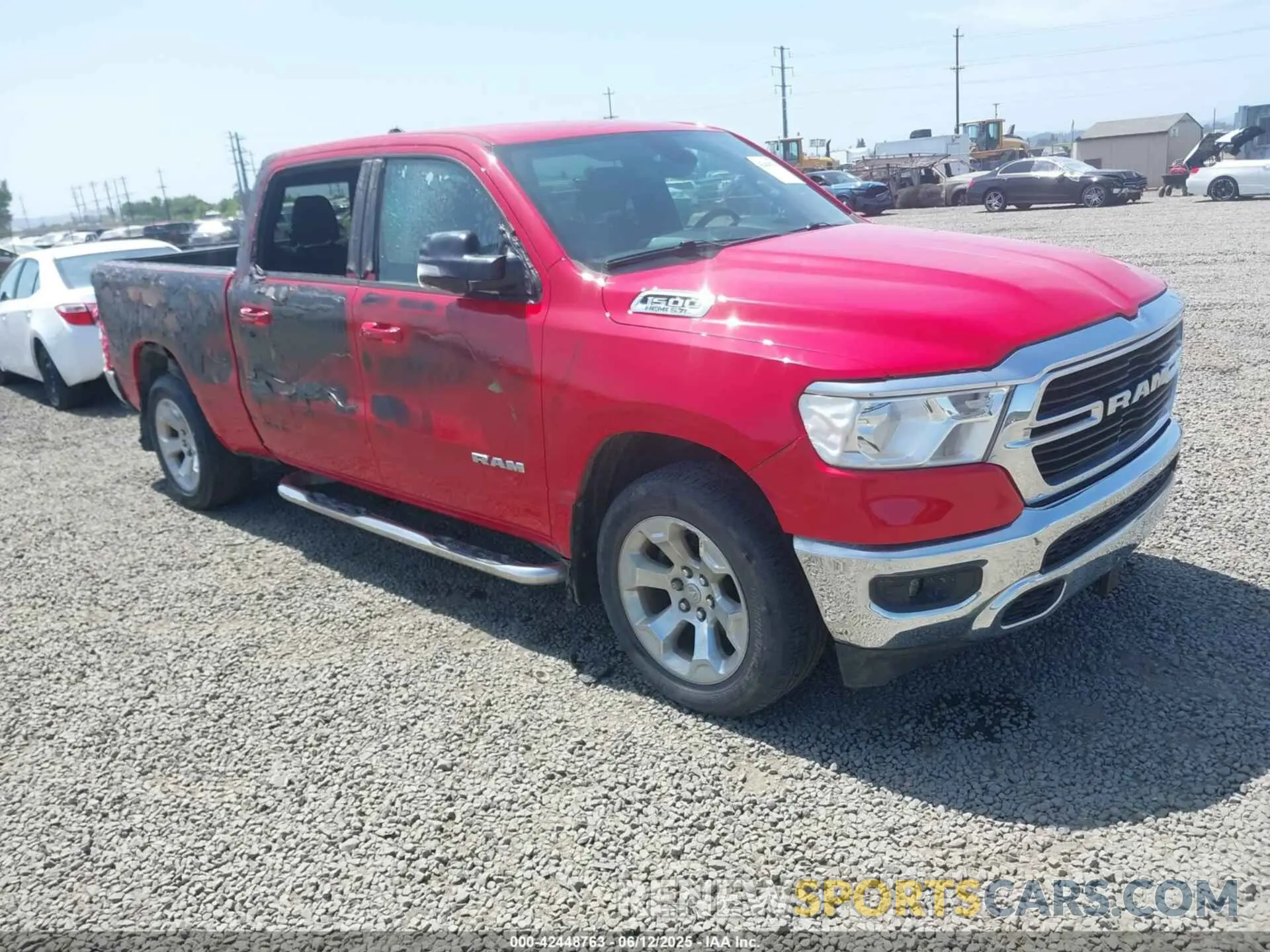 1 Photograph of a damaged car 1C6SRFMT4MN562473 RAM 1500 2021