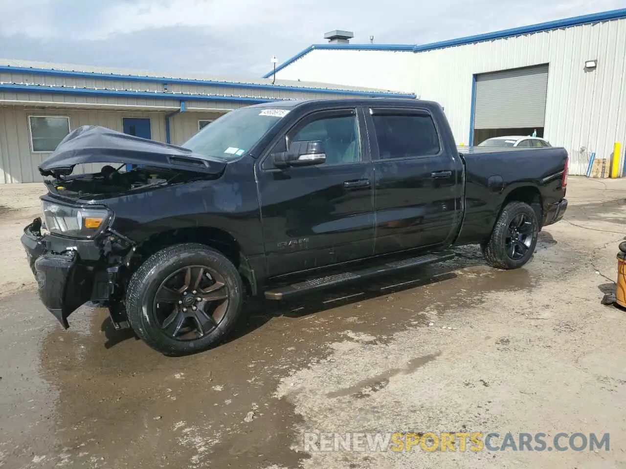 1 Photograph of a damaged car 1C6SRFMT4MN602776 RAM 1500 2021