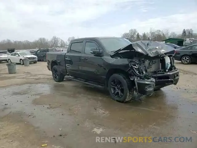 14 Photograph of a damaged car 1C6SRFMT4MN602776 RAM 1500 2021