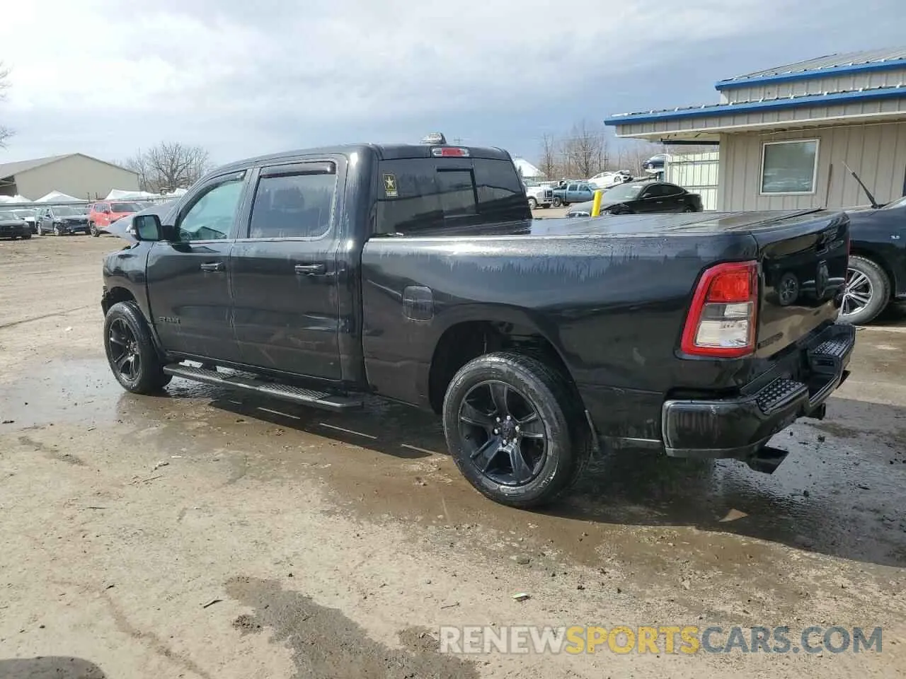 2 Photograph of a damaged car 1C6SRFMT4MN602776 RAM 1500 2021