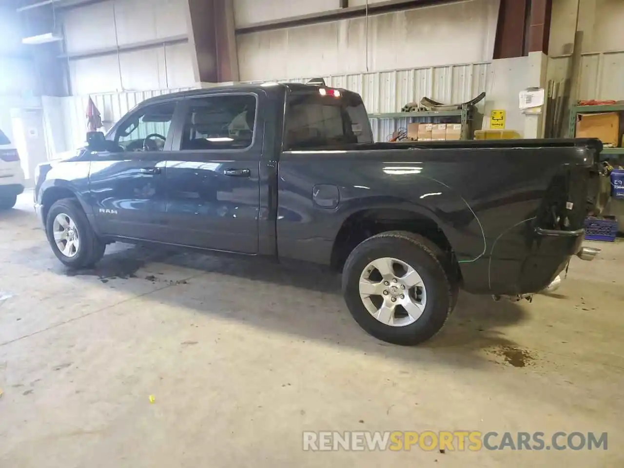 2 Photograph of a damaged car 1C6SRFMT5MN821763 RAM 1500 2021