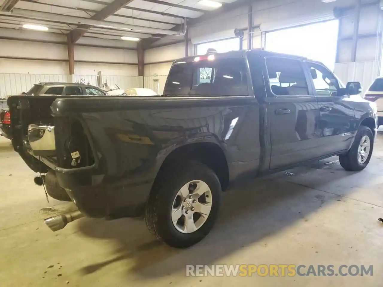 3 Photograph of a damaged car 1C6SRFMT5MN821763 RAM 1500 2021