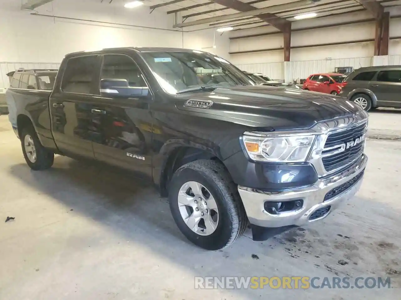 4 Photograph of a damaged car 1C6SRFMT5MN821763 RAM 1500 2021