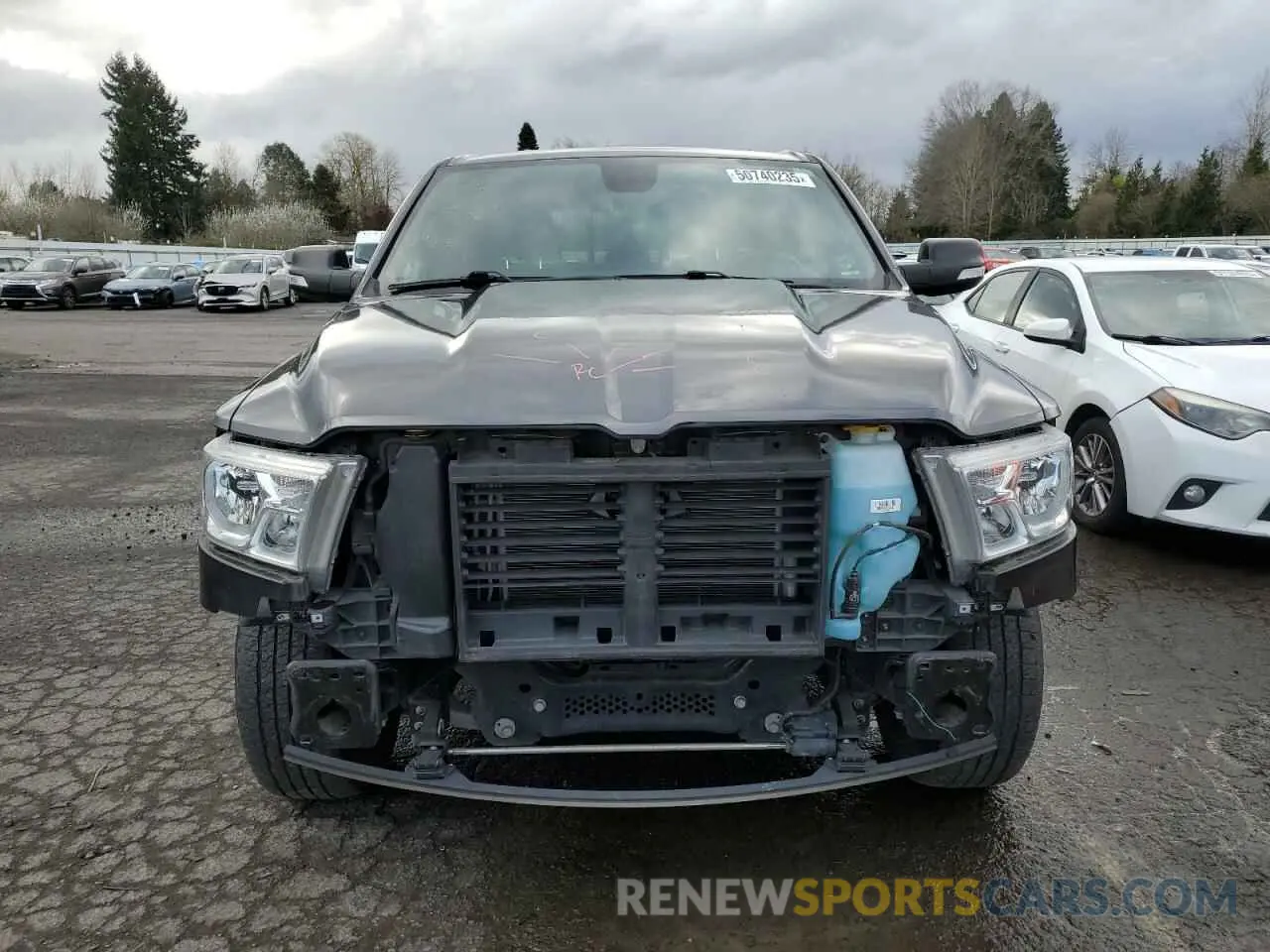 5 Photograph of a damaged car 1C6SRFMT6MN615853 RAM 1500 2021