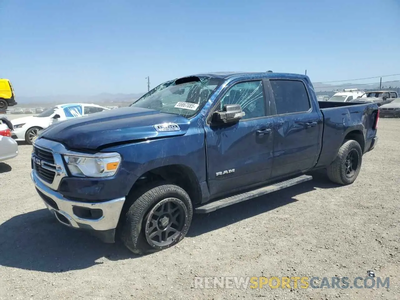 1 Photograph of a damaged car 1C6SRFMTXMN562364 RAM 1500 2021