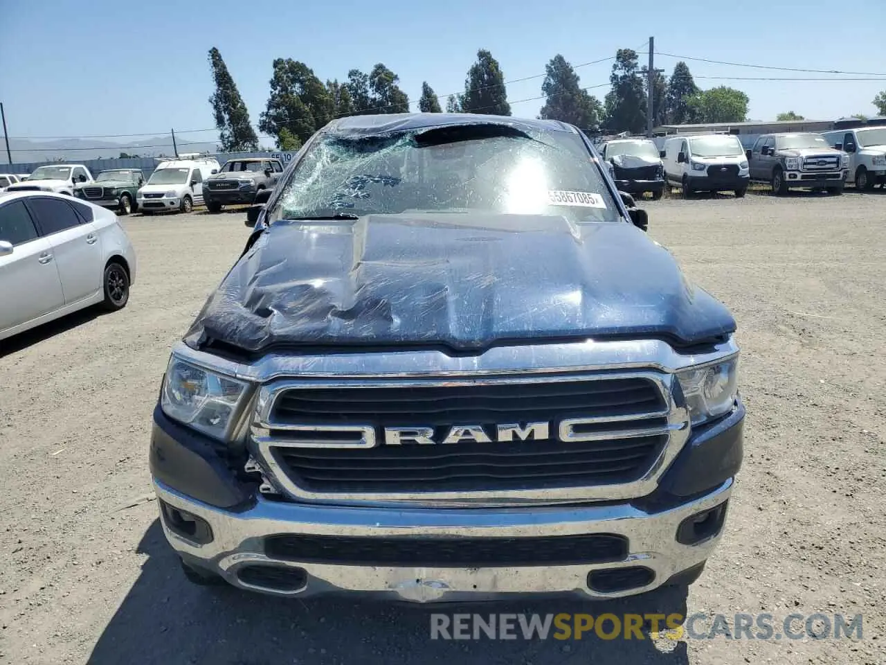 5 Photograph of a damaged car 1C6SRFMTXMN562364 RAM 1500 2021