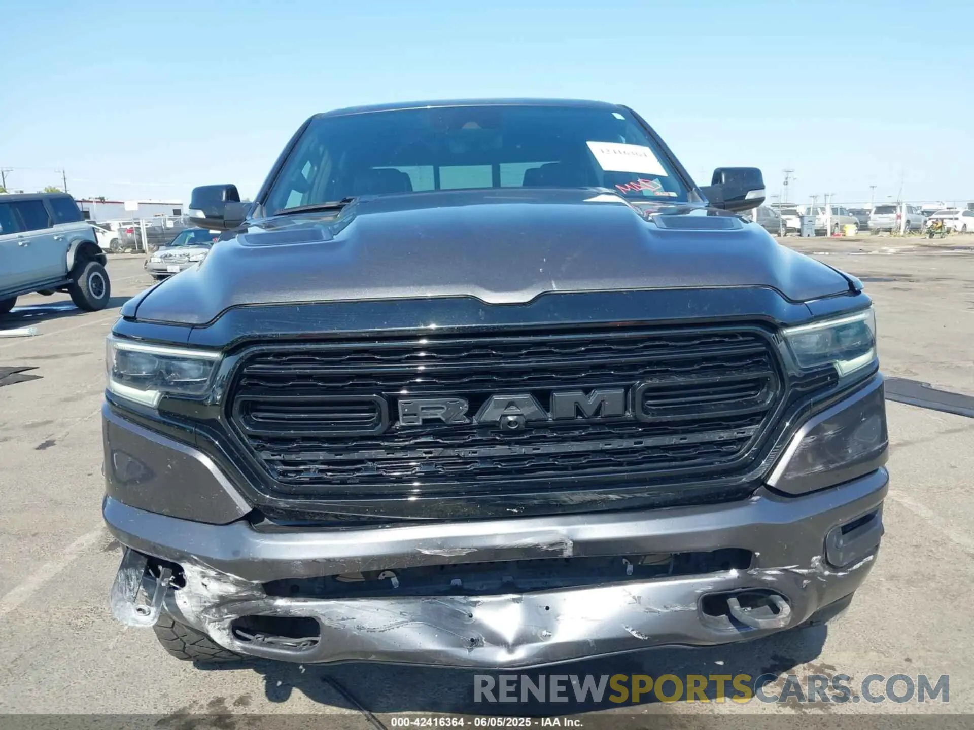 12 Photograph of a damaged car 1C6SRFPT2MN830643 RAM 1500 2021