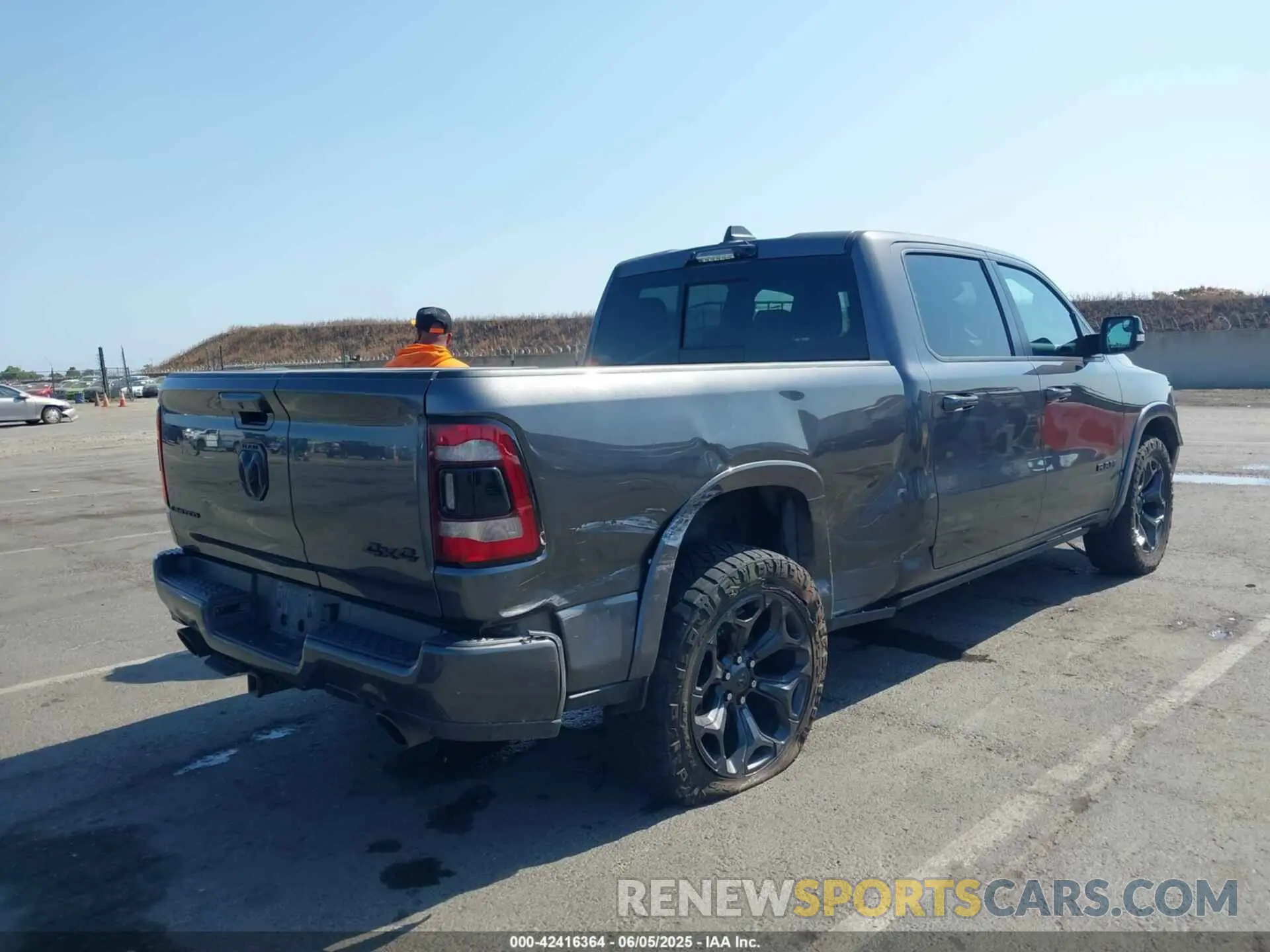 4 Photograph of a damaged car 1C6SRFPT2MN830643 RAM 1500 2021