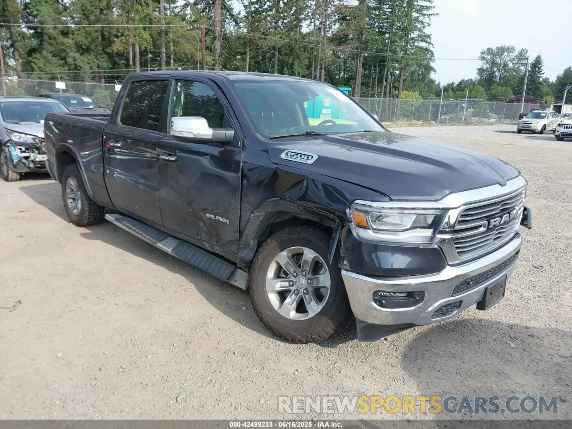 1 Photograph of a damaged car 1C6SRFRT0MN803762 RAM 1500 2021