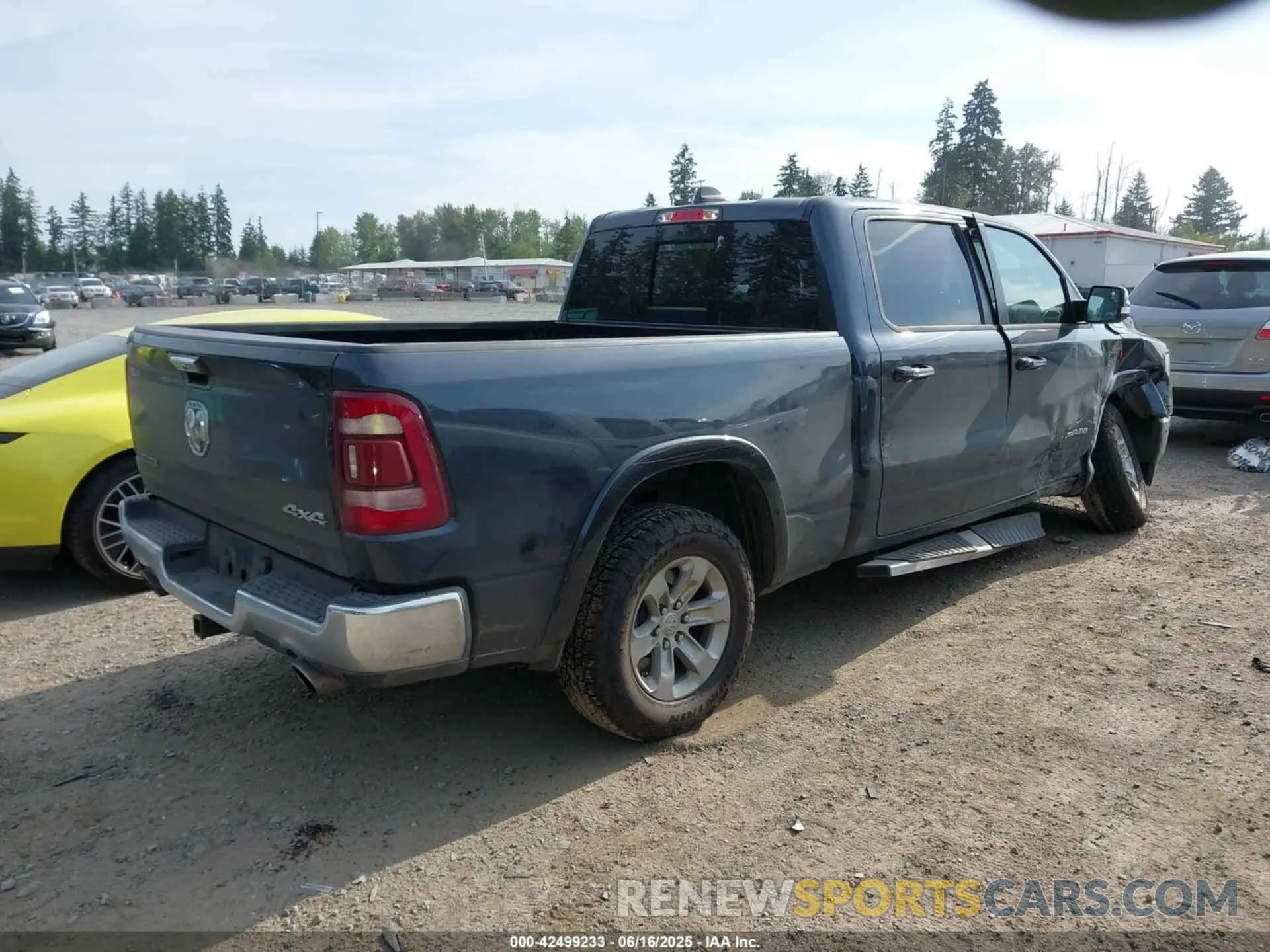 4 Photograph of a damaged car 1C6SRFRT0MN803762 RAM 1500 2021