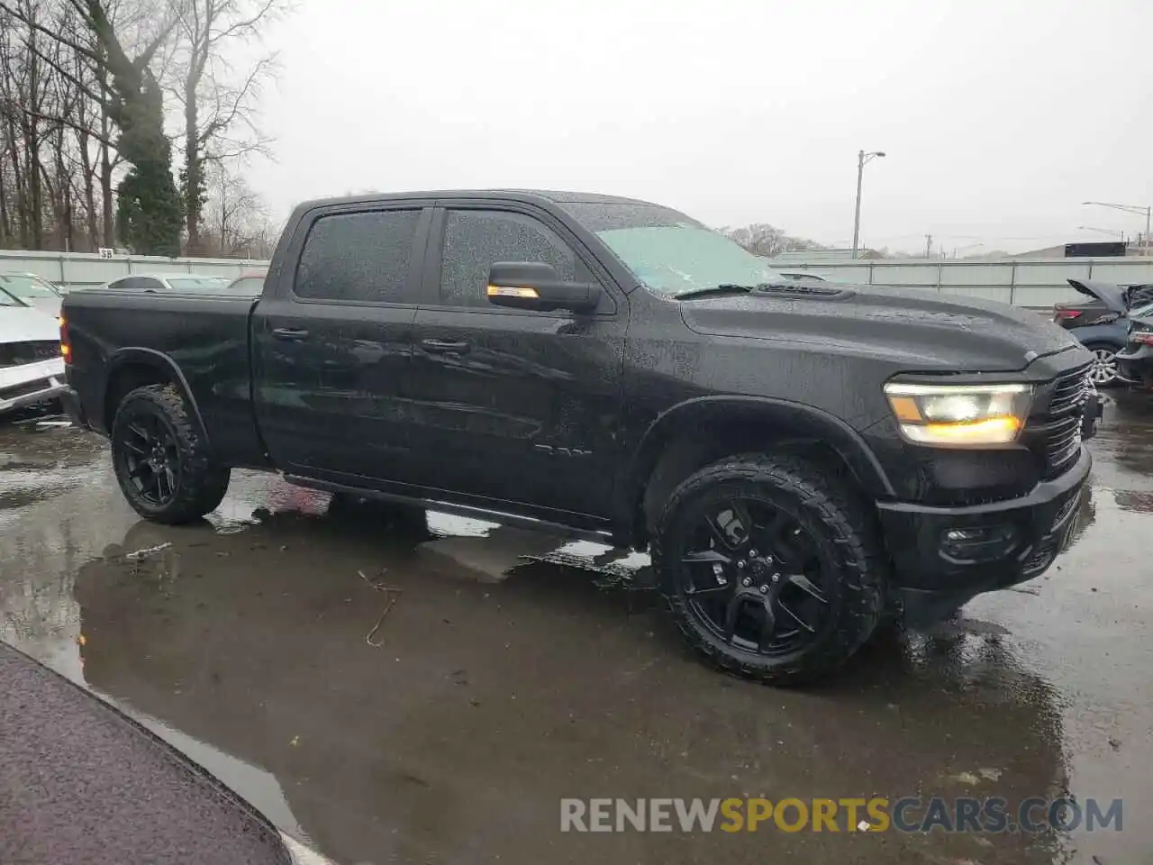 4 Photograph of a damaged car 1C6SRFRT2MN570208 RAM 1500 2021