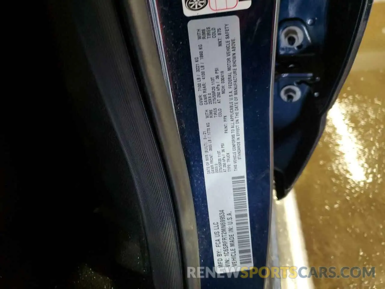 12 Photograph of a damaged car 1C6SRFRT2MN699534 RAM 1500 2021
