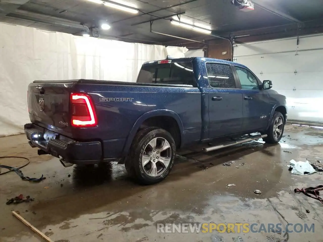 3 Photograph of a damaged car 1C6SRFRT2MN699534 RAM 1500 2021