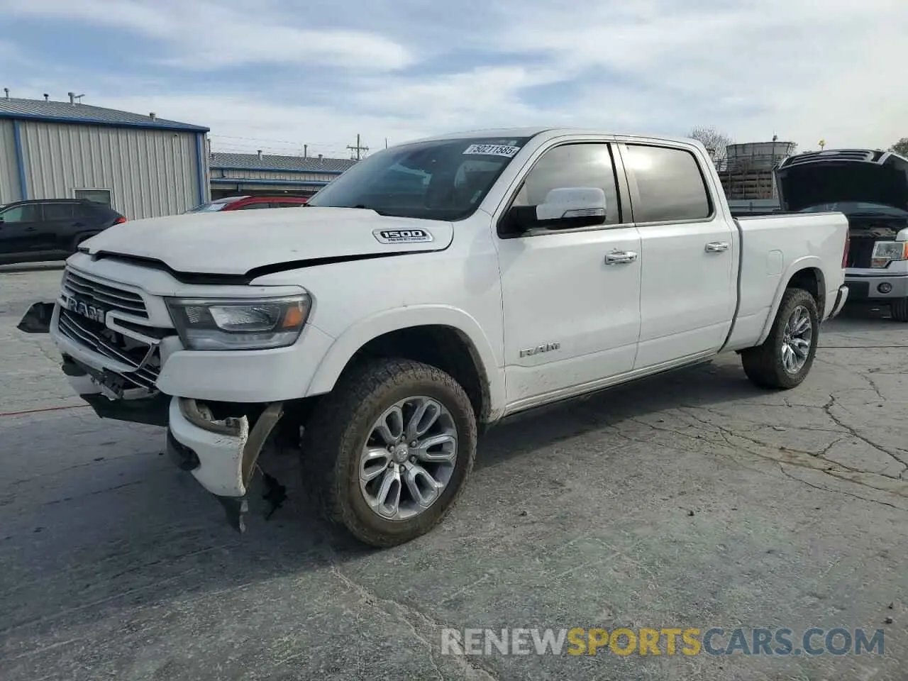 1 Photograph of a damaged car 1C6SRFRT4MN831791 RAM 1500 2021