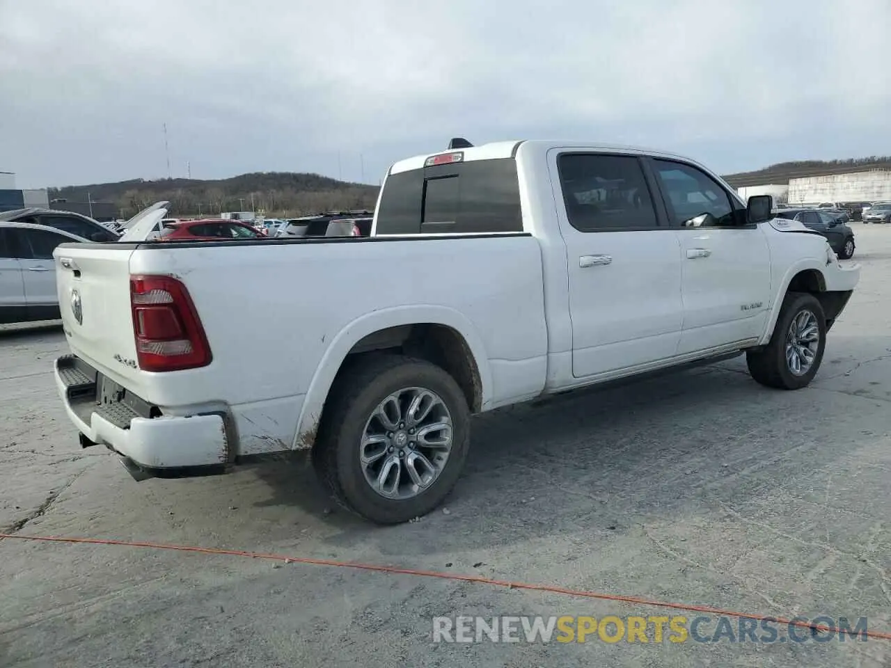 3 Photograph of a damaged car 1C6SRFRT4MN831791 RAM 1500 2021