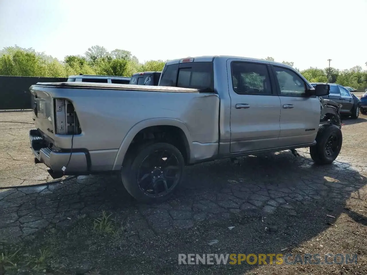 3 Photograph of a damaged car 1C6SRFRT5MN740318 RAM 1500 2021