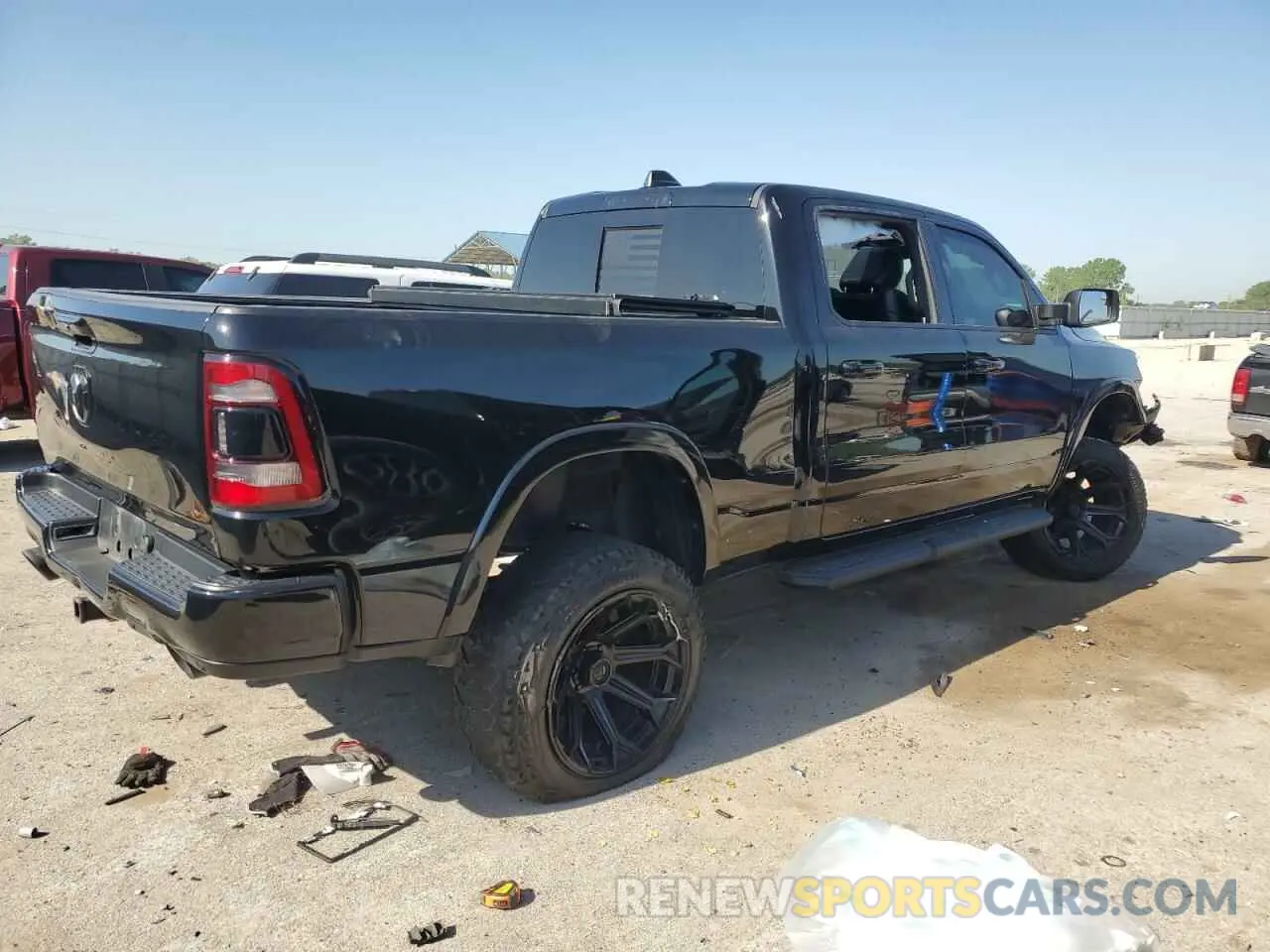 3 Photograph of a damaged car 1C6SRFRT7MN778438 RAM 1500 2021