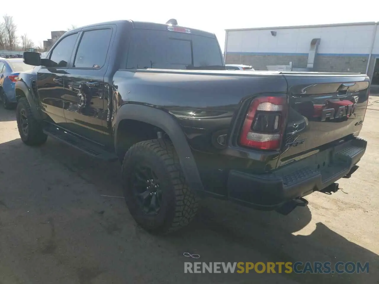 2 Photograph of a damaged car 1C6SRFU90MN901475 RAM 1500 2021