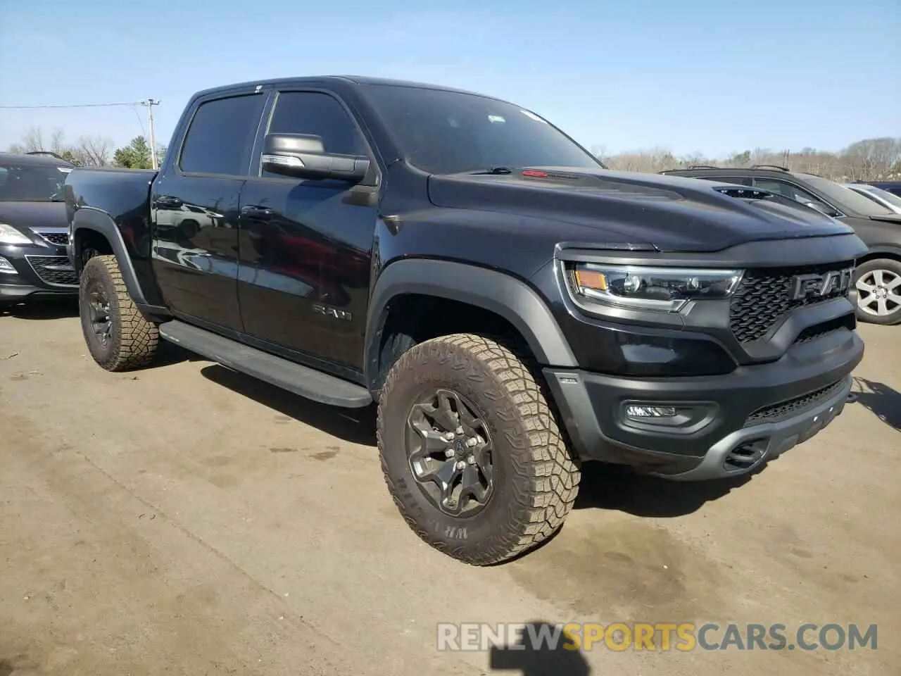 4 Photograph of a damaged car 1C6SRFU90MN901475 RAM 1500 2021