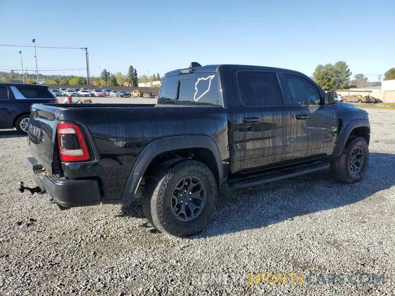3 Photograph of a damaged car 1C6SRFU91MN723933 RAM 1500 2021