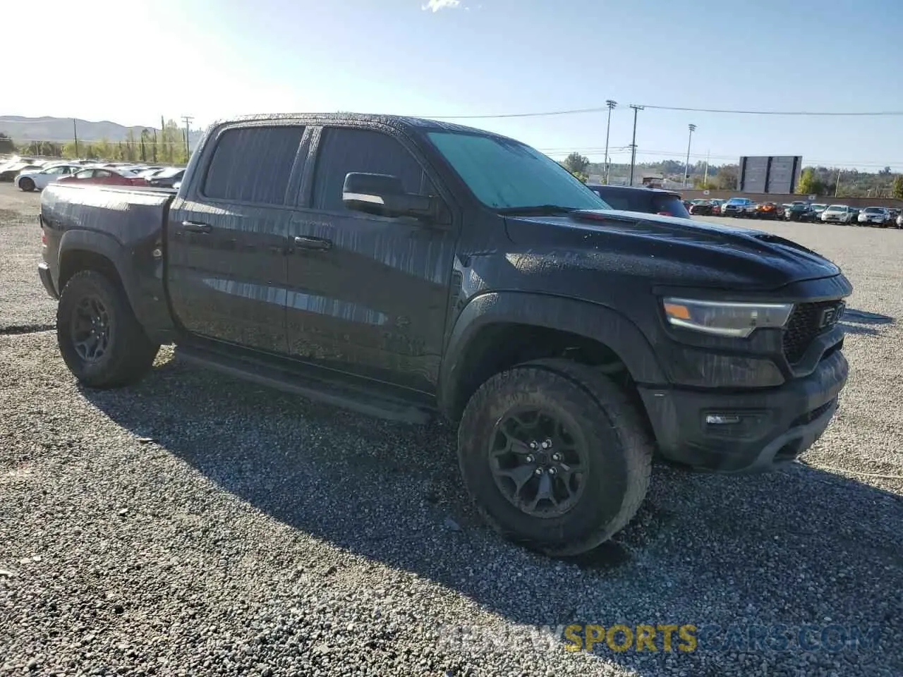 4 Photograph of a damaged car 1C6SRFU91MN723933 RAM 1500 2021