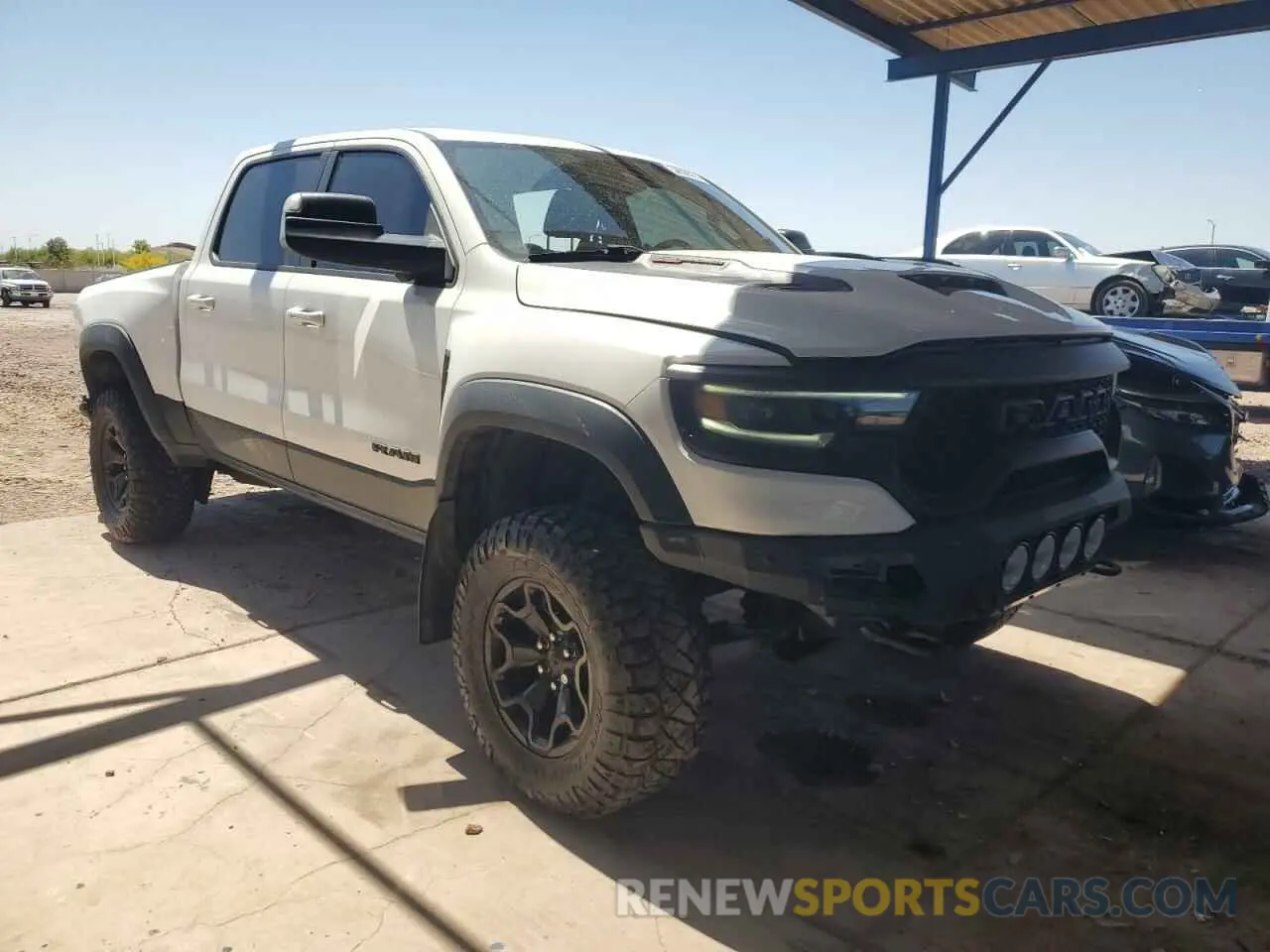 4 Photograph of a damaged car 1C6SRFU91MN804608 RAM 1500 2021