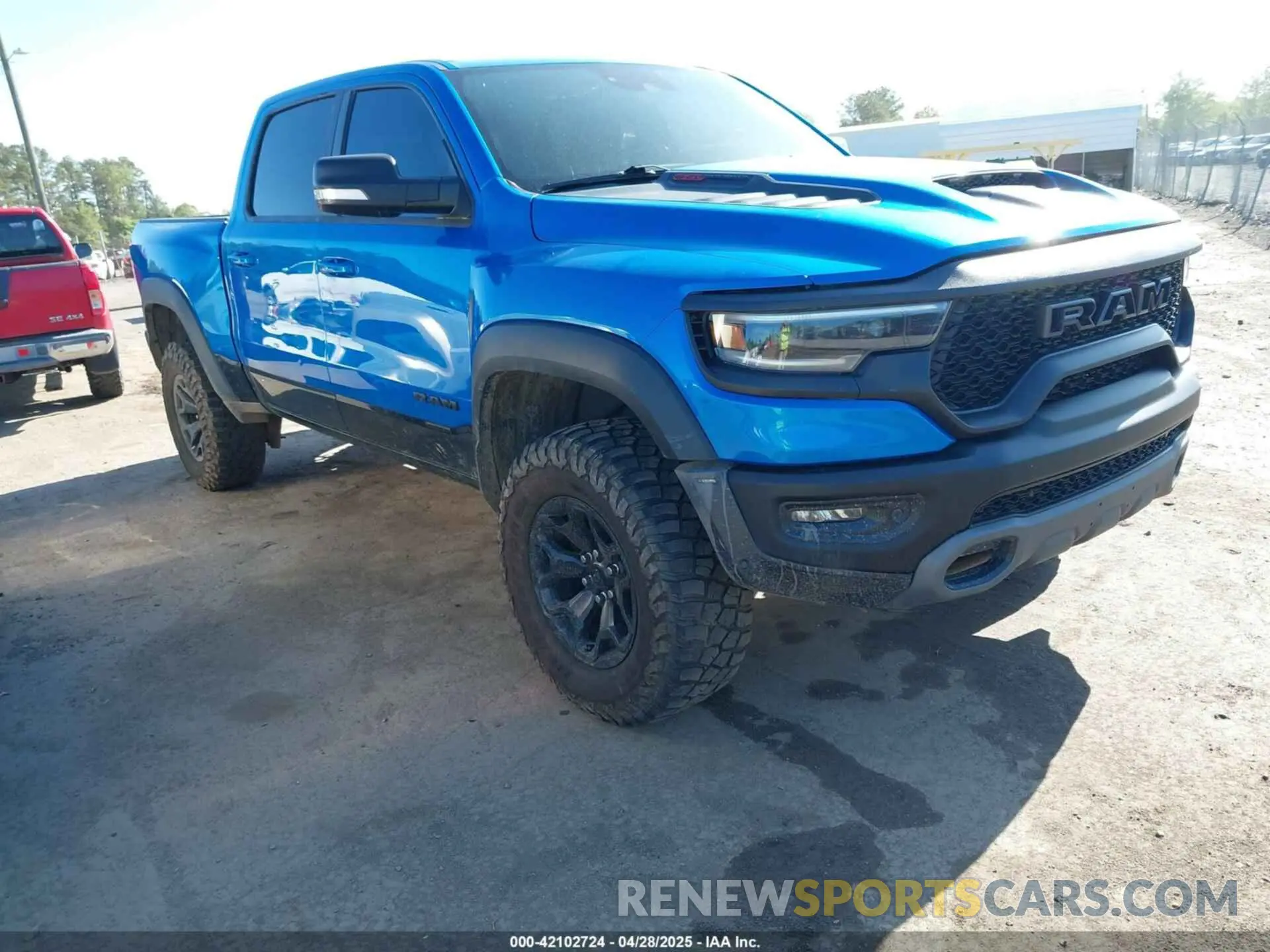 1 Photograph of a damaged car 1C6SRFU91MN900450 RAM 1500 2021