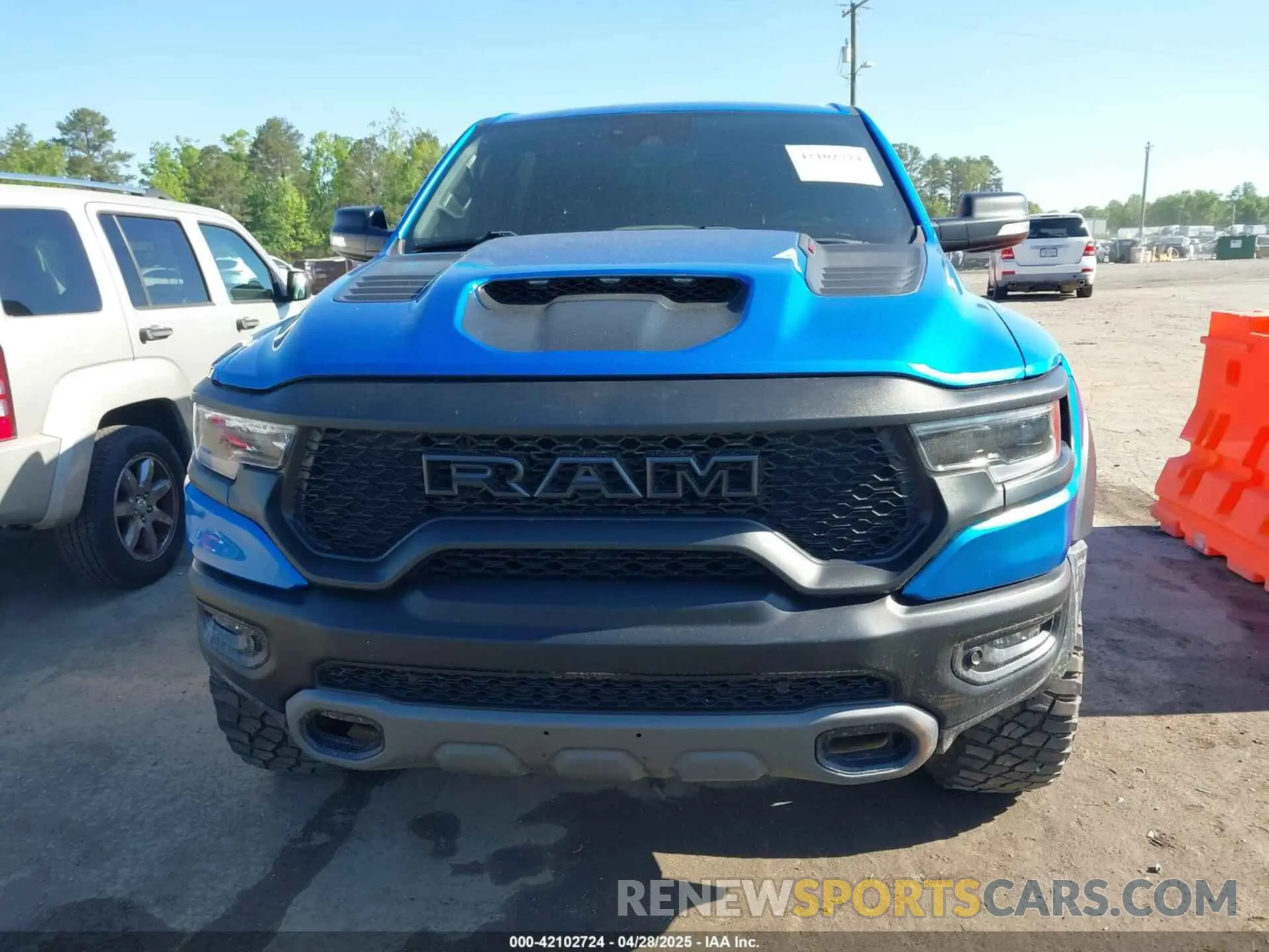 11 Photograph of a damaged car 1C6SRFU91MN900450 RAM 1500 2021