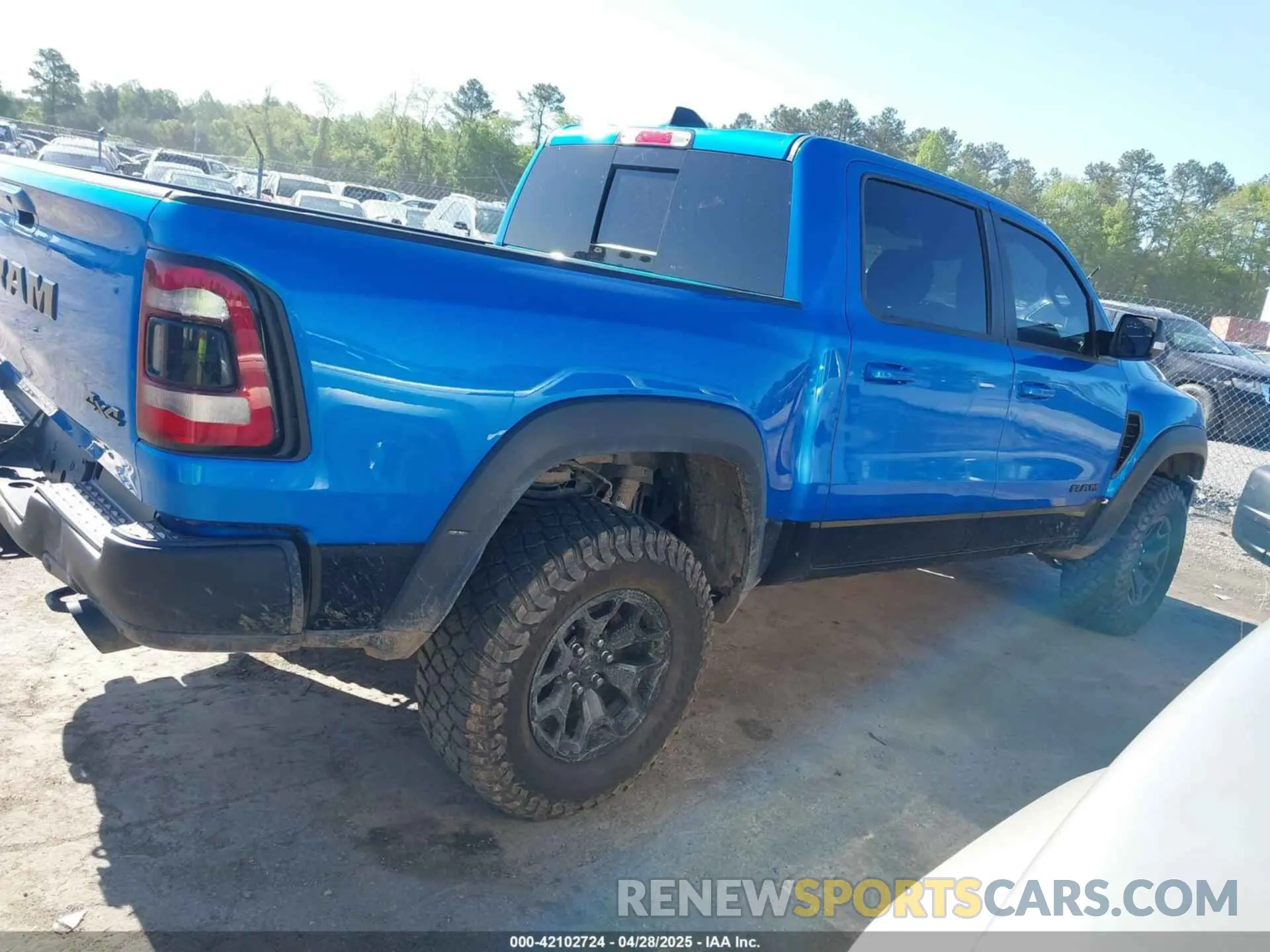12 Photograph of a damaged car 1C6SRFU91MN900450 RAM 1500 2021