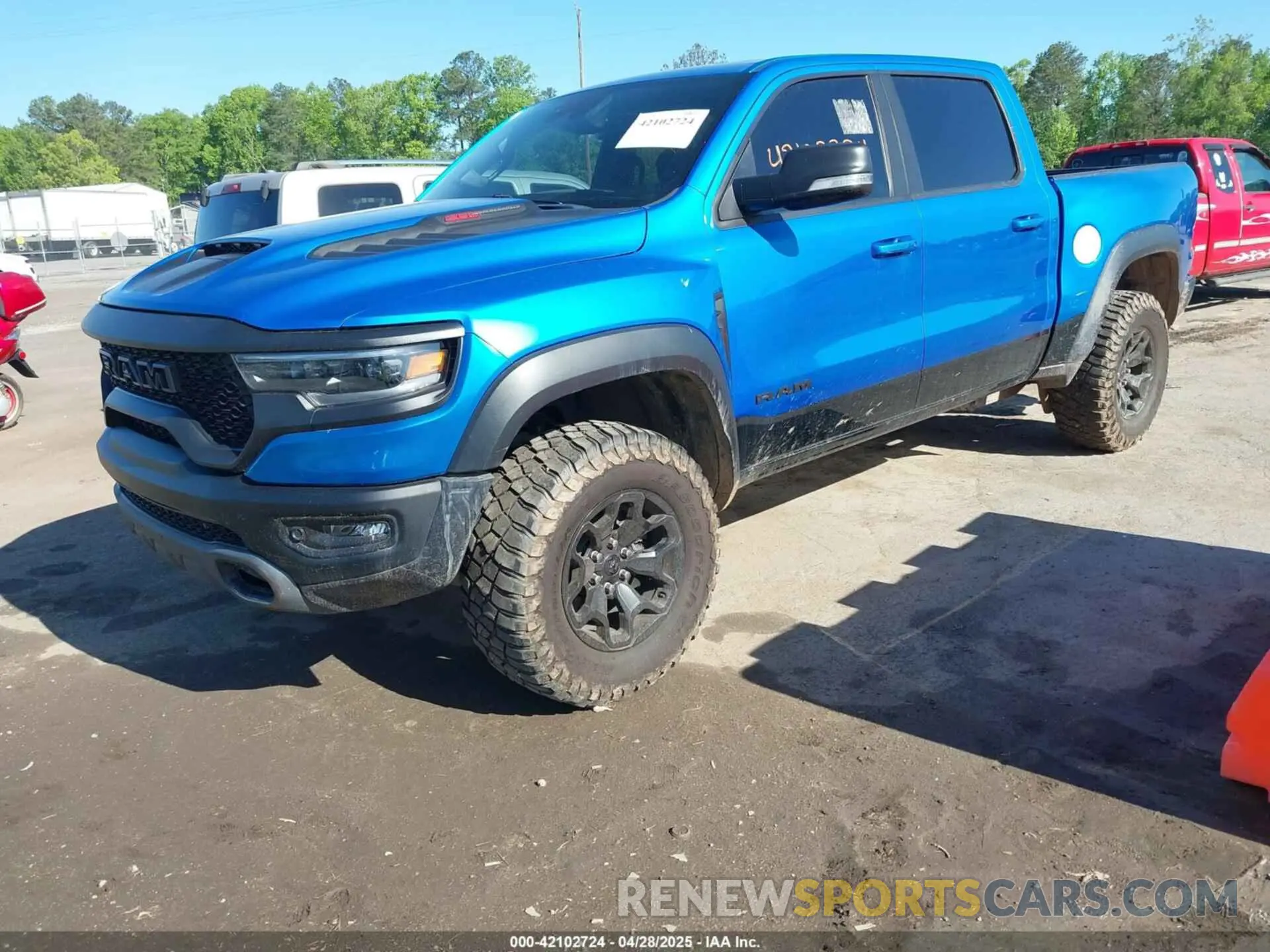 2 Photograph of a damaged car 1C6SRFU91MN900450 RAM 1500 2021