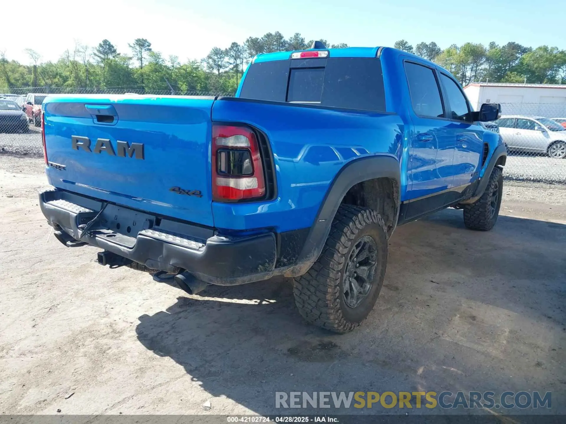 4 Photograph of a damaged car 1C6SRFU91MN900450 RAM 1500 2021