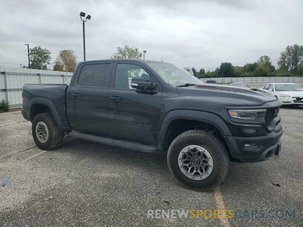 4 Photograph of a damaged car 1C6SRFU91MN902652 RAM 1500 2021
