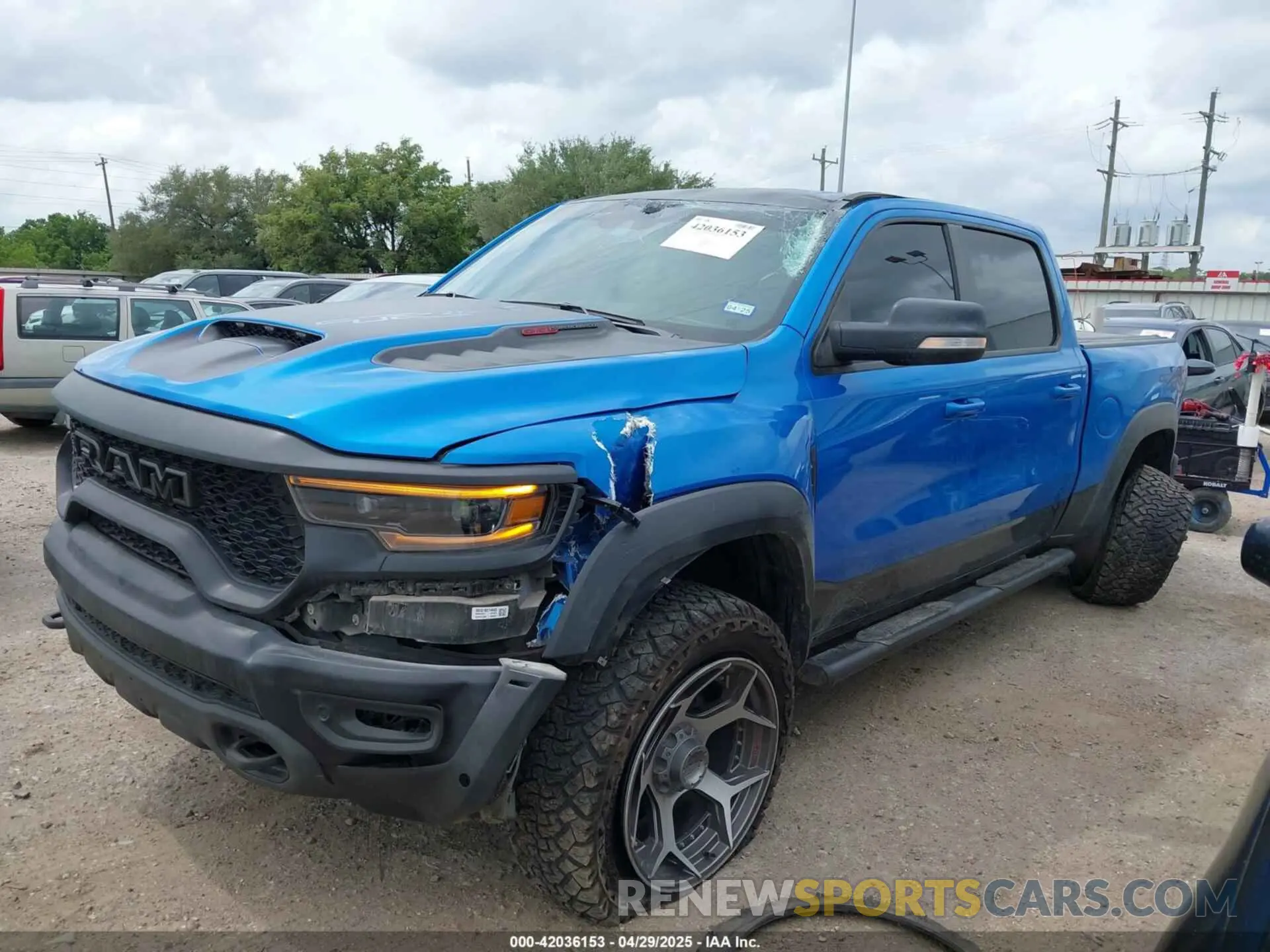 2 Photograph of a damaged car 1C6SRFU91MN903851 RAM 1500 2021