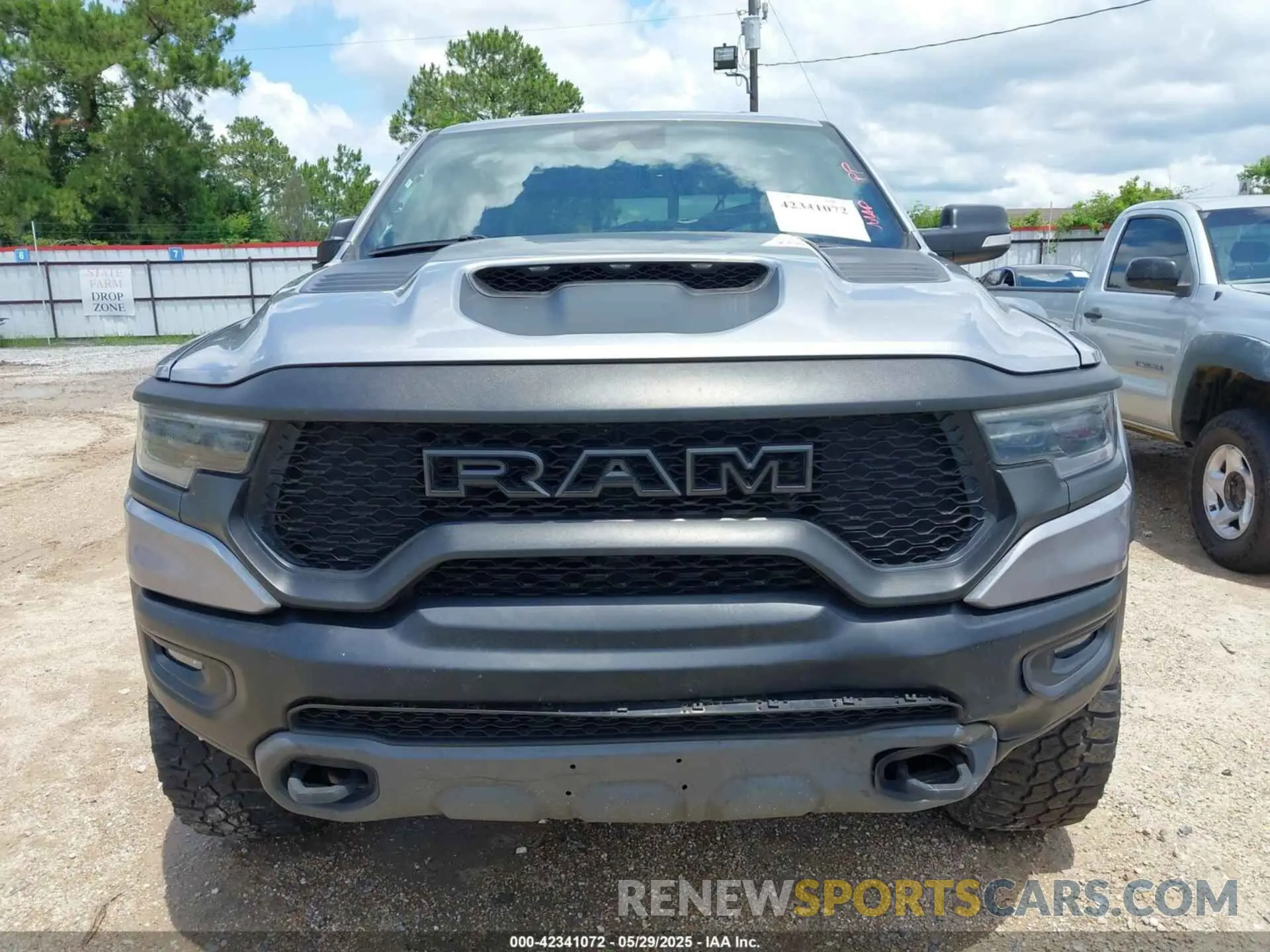 13 Photograph of a damaged car 1C6SRFU92MN819375 RAM 1500 2021