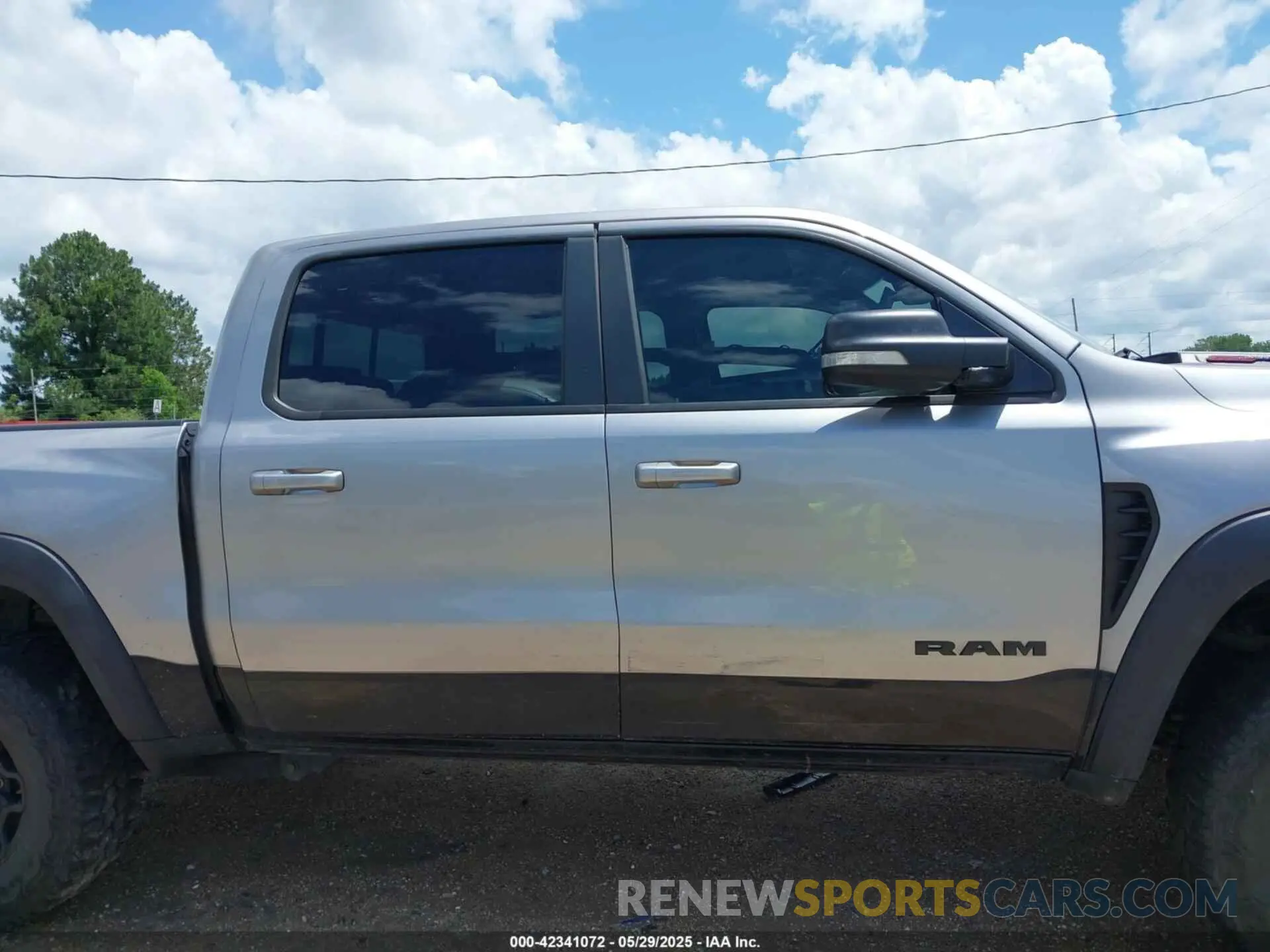 14 Photograph of a damaged car 1C6SRFU92MN819375 RAM 1500 2021