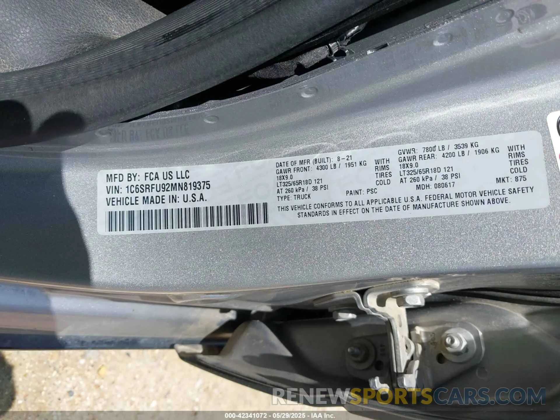 9 Photograph of a damaged car 1C6SRFU92MN819375 RAM 1500 2021
