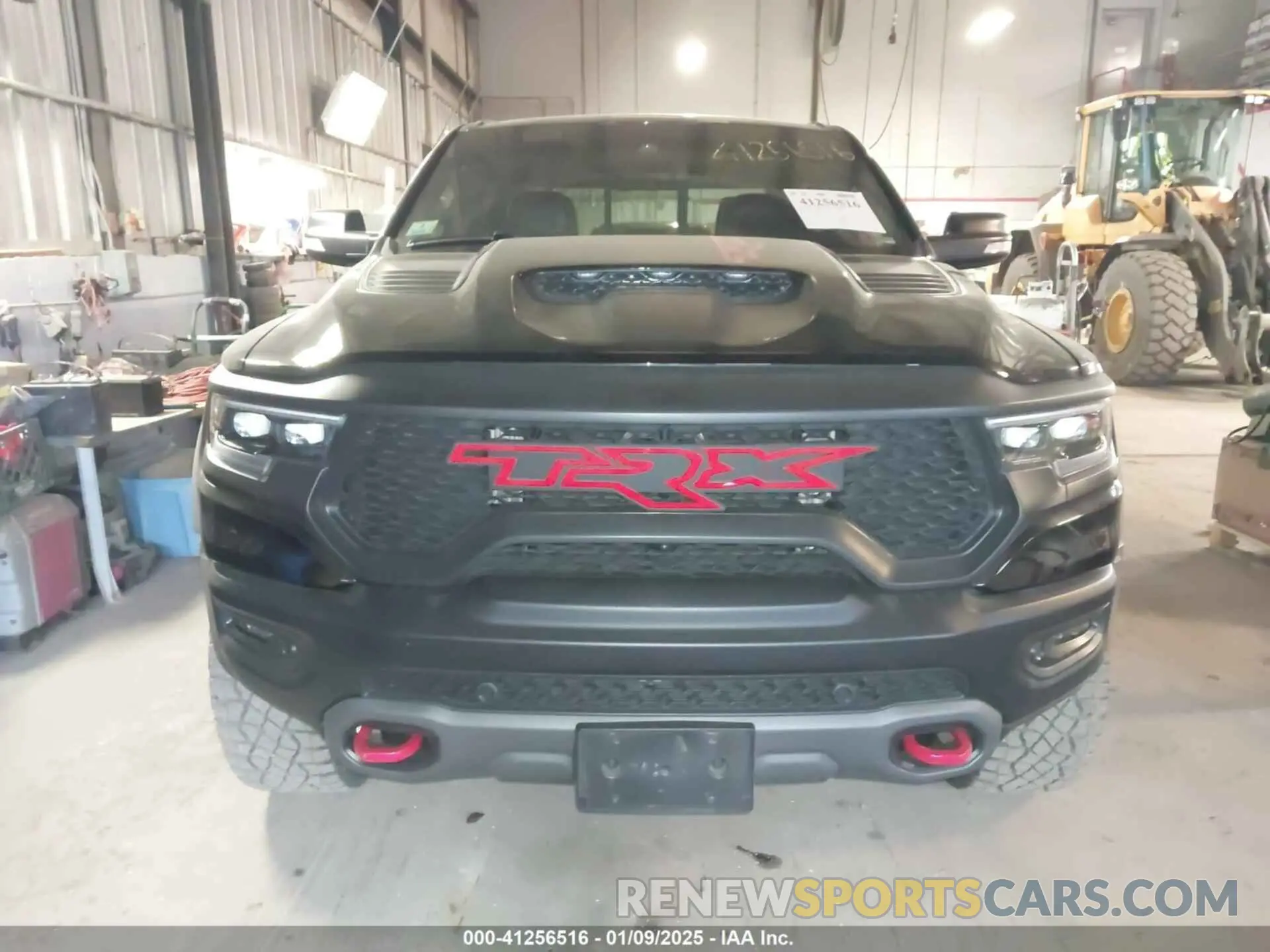 12 Photograph of a damaged car 1C6SRFU92MN902580 RAM 1500 2021