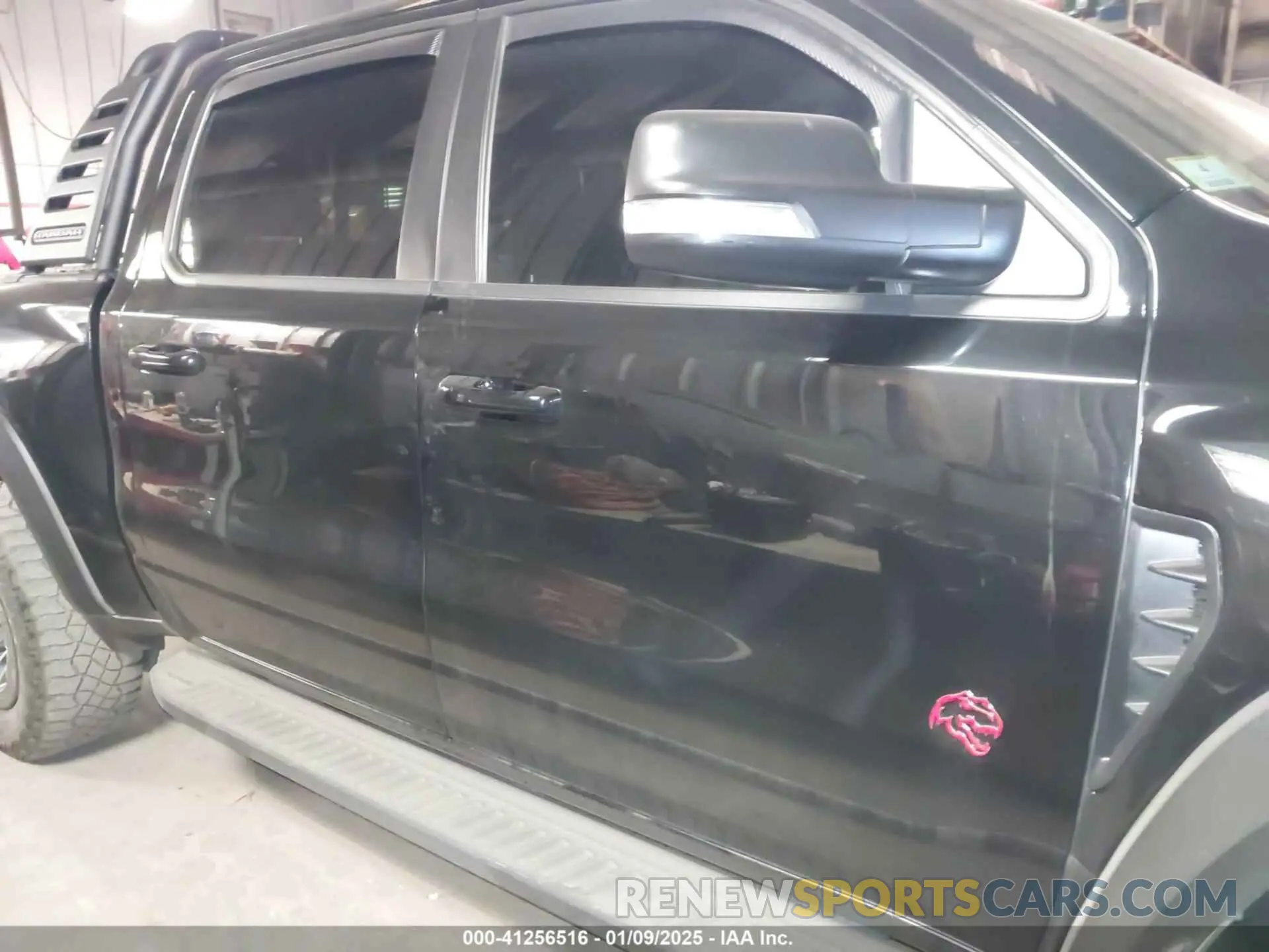 13 Photograph of a damaged car 1C6SRFU92MN902580 RAM 1500 2021