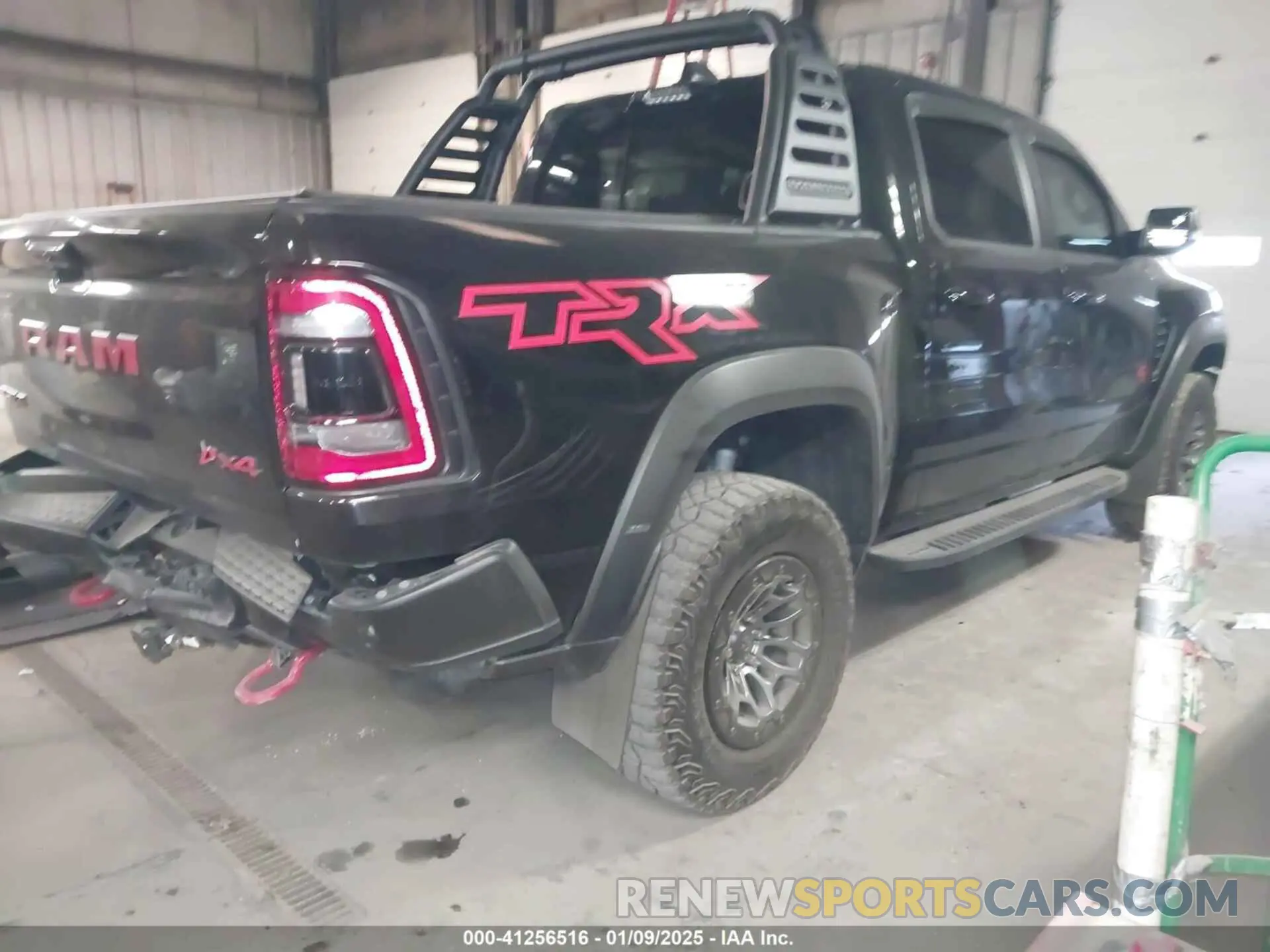 4 Photograph of a damaged car 1C6SRFU92MN902580 RAM 1500 2021