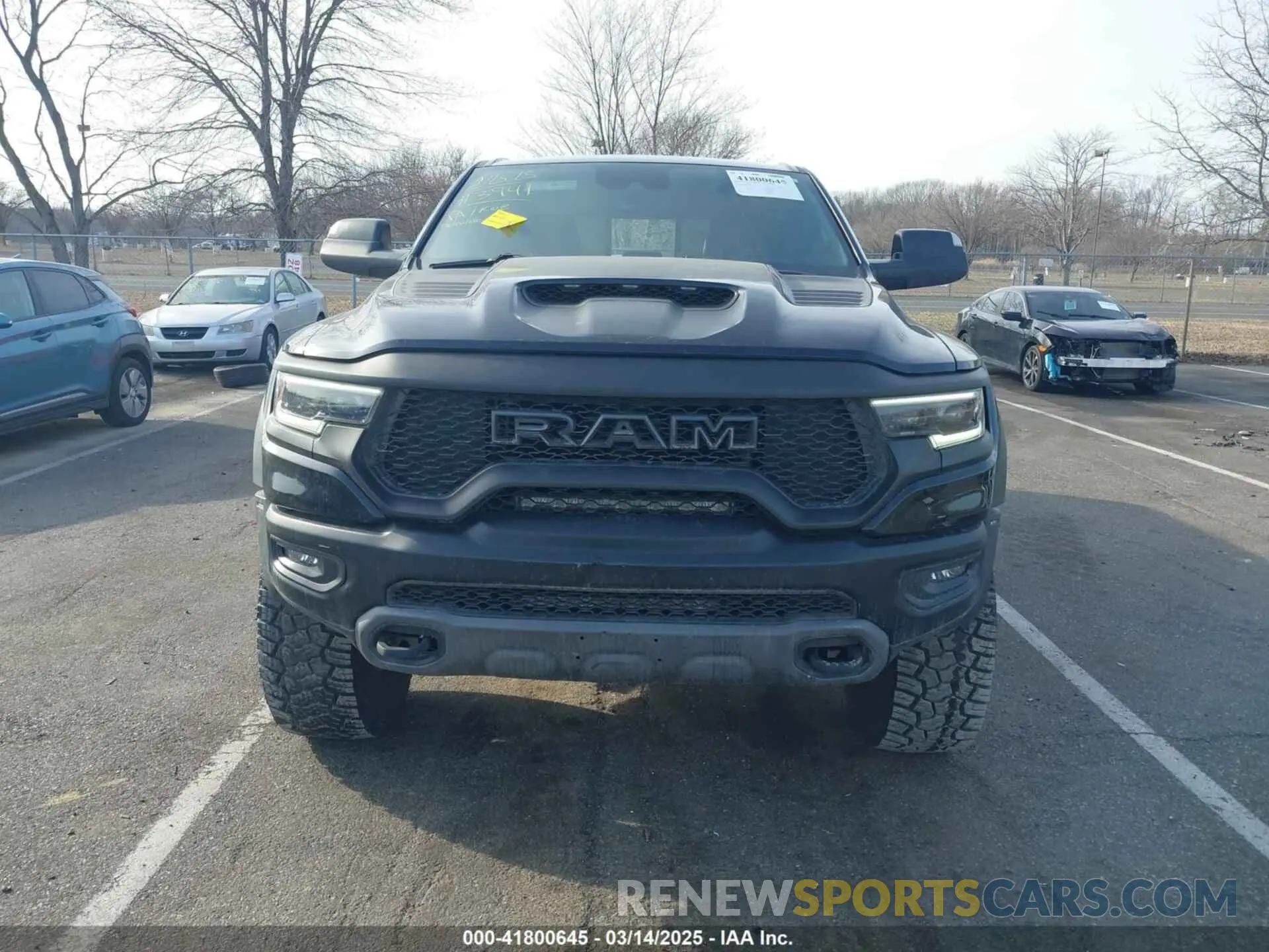 12 Photograph of a damaged car 1C6SRFU92MN903941 RAM 1500 2021