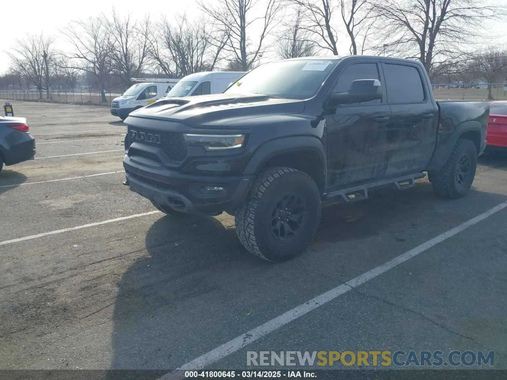 2 Photograph of a damaged car 1C6SRFU92MN903941 RAM 1500 2021